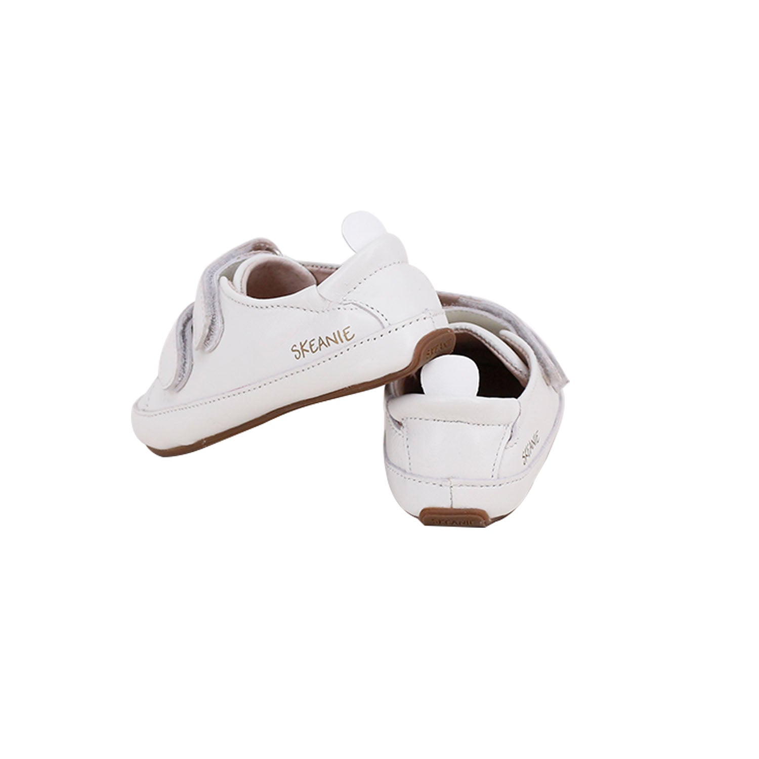 Tyler Trainers First Walker Sneakers in White, made from soft leather with a hook and loop fastener, designed for toddlers.