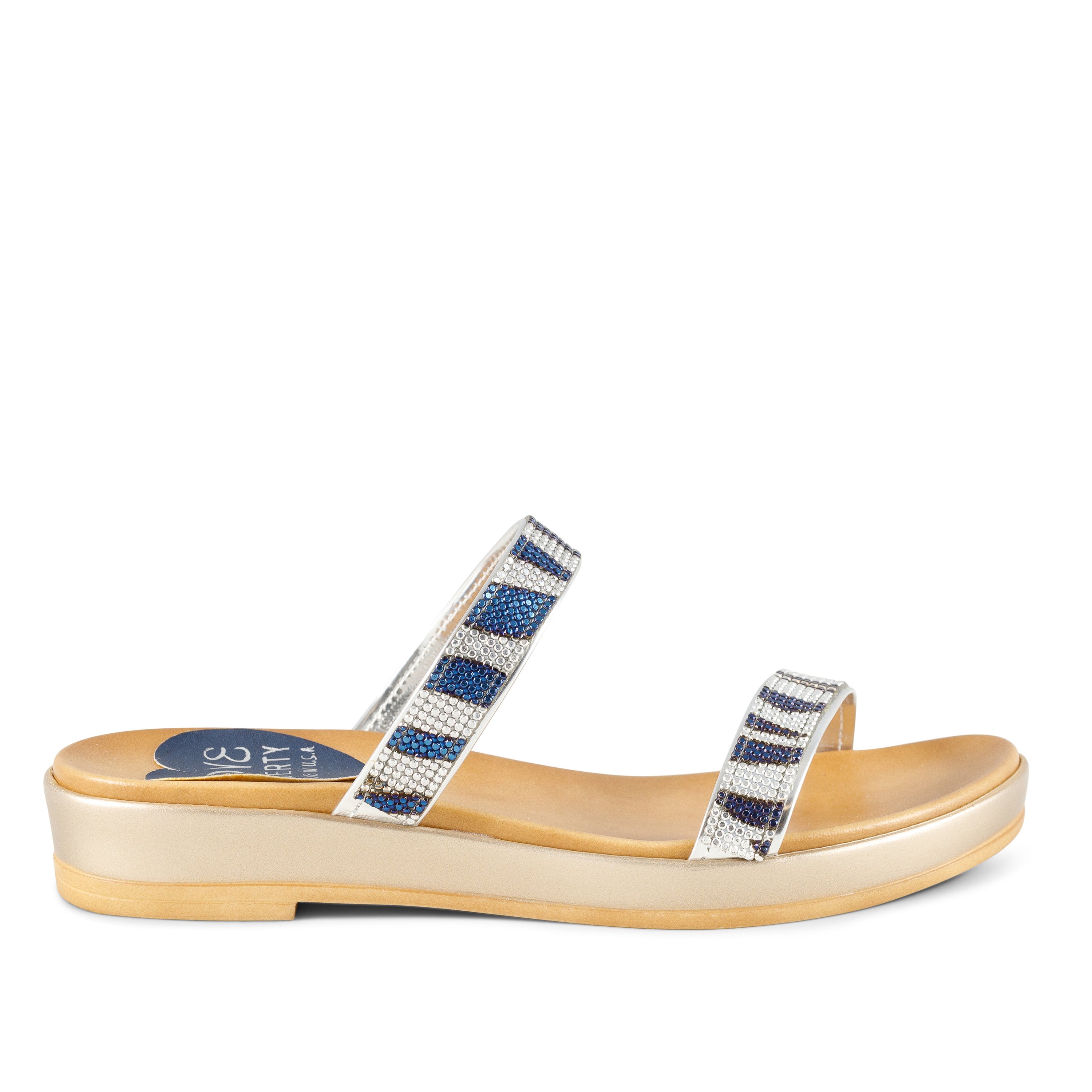 A pair of stylish Untamed sandals featuring a bold zebra print design in black and blue, showcasing rhinestone accents and a comfortable low wedge.