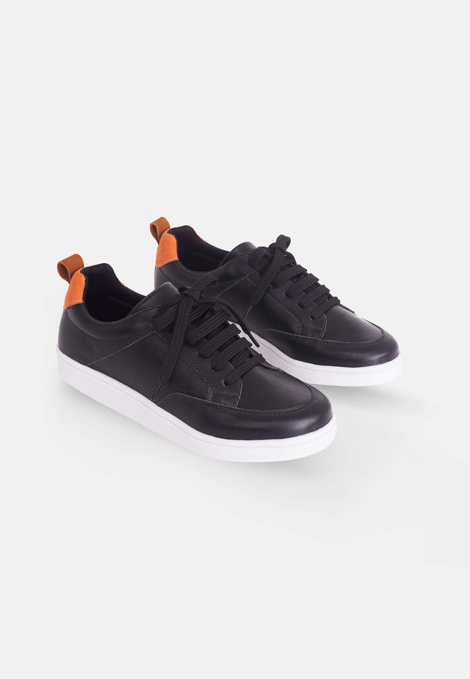 A pair of Mangará Angelim Women's Sneakers in sleek black leather with vibrant orange and blue details, showcasing a stylish lace-up design.