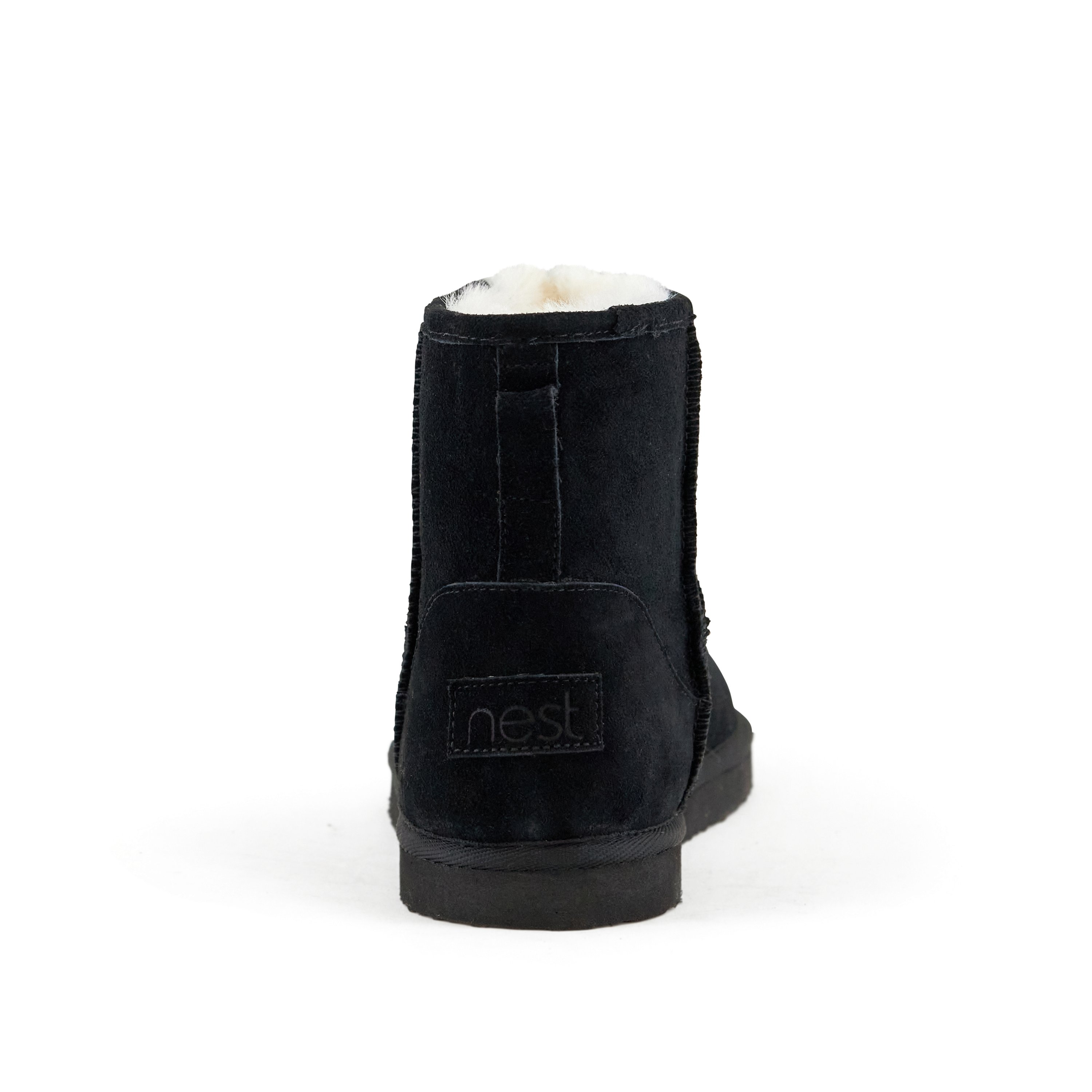 Women's Whitney Short Pull On Boot in Black with faux fur interior and genuine suede upper, showcasing its stylish design and comfort features.