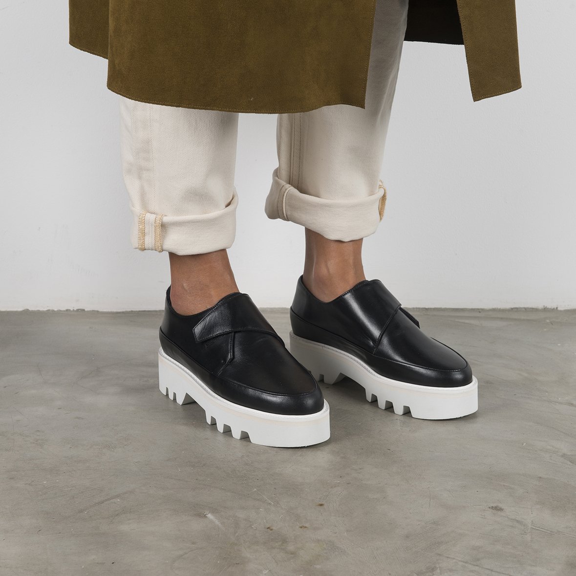 Stylish WRAP UP Black Leather Platform Creepers with Velcro strap, showcasing premium Italian leather and lightweight Vibram sole.