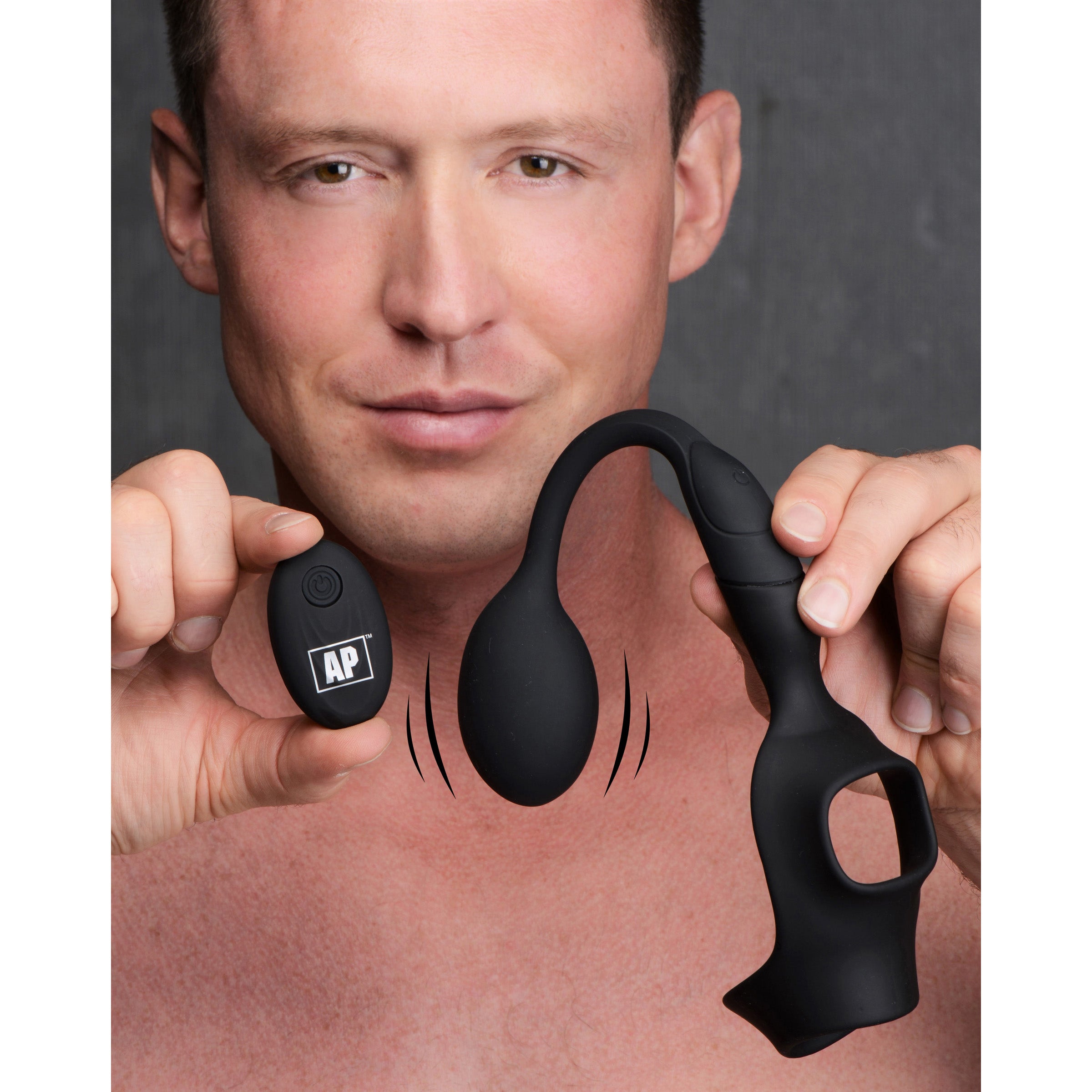 10X P-BOMB Cock & Ball Ring with Vibrating Anal Plug in sleek black silicone, showcasing its design and features.