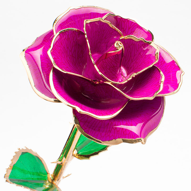 A stunning 24K gold-plated rose flower elegantly displayed in a gift box, symbolizing eternal love and appreciation.