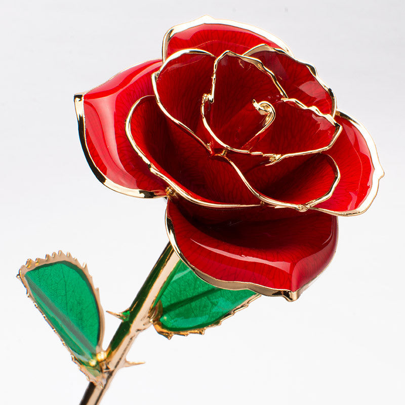 A stunning 24K gold-plated rose flower elegantly displayed in a gift box, symbolizing eternal love and appreciation.