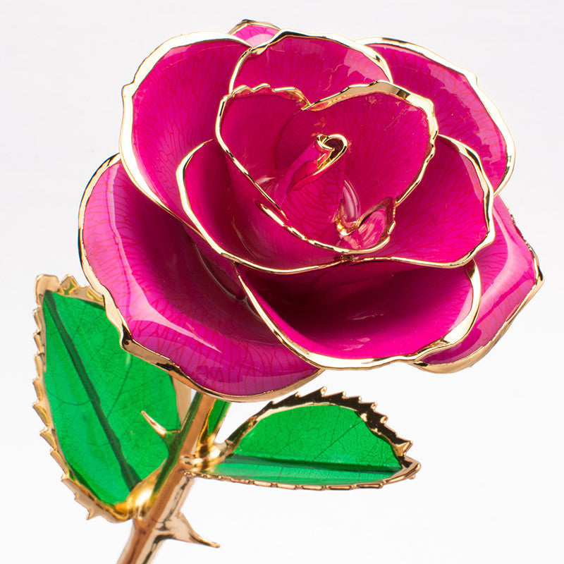 A stunning 24K gold-plated rose flower elegantly displayed in a gift box, symbolizing eternal love and appreciation.