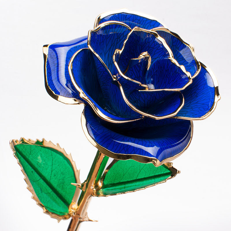 A stunning 24K gold-plated rose flower elegantly displayed in a gift box, symbolizing eternal love and appreciation.