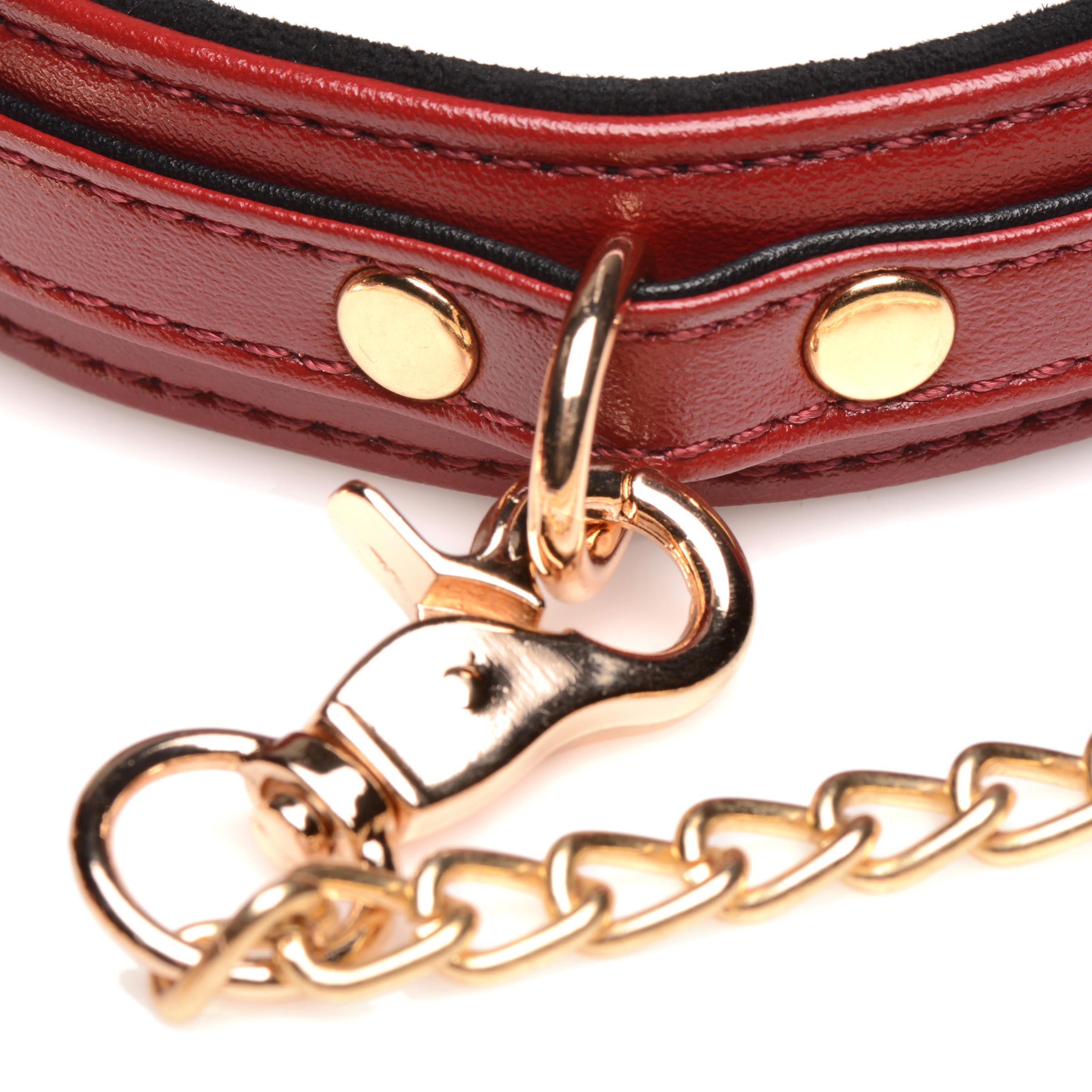 6 Piece Burgundy Bondage Set featuring adjustable cuffs, a collar, and a detachable leash, all in a luxurious burgundy color with gold accents.