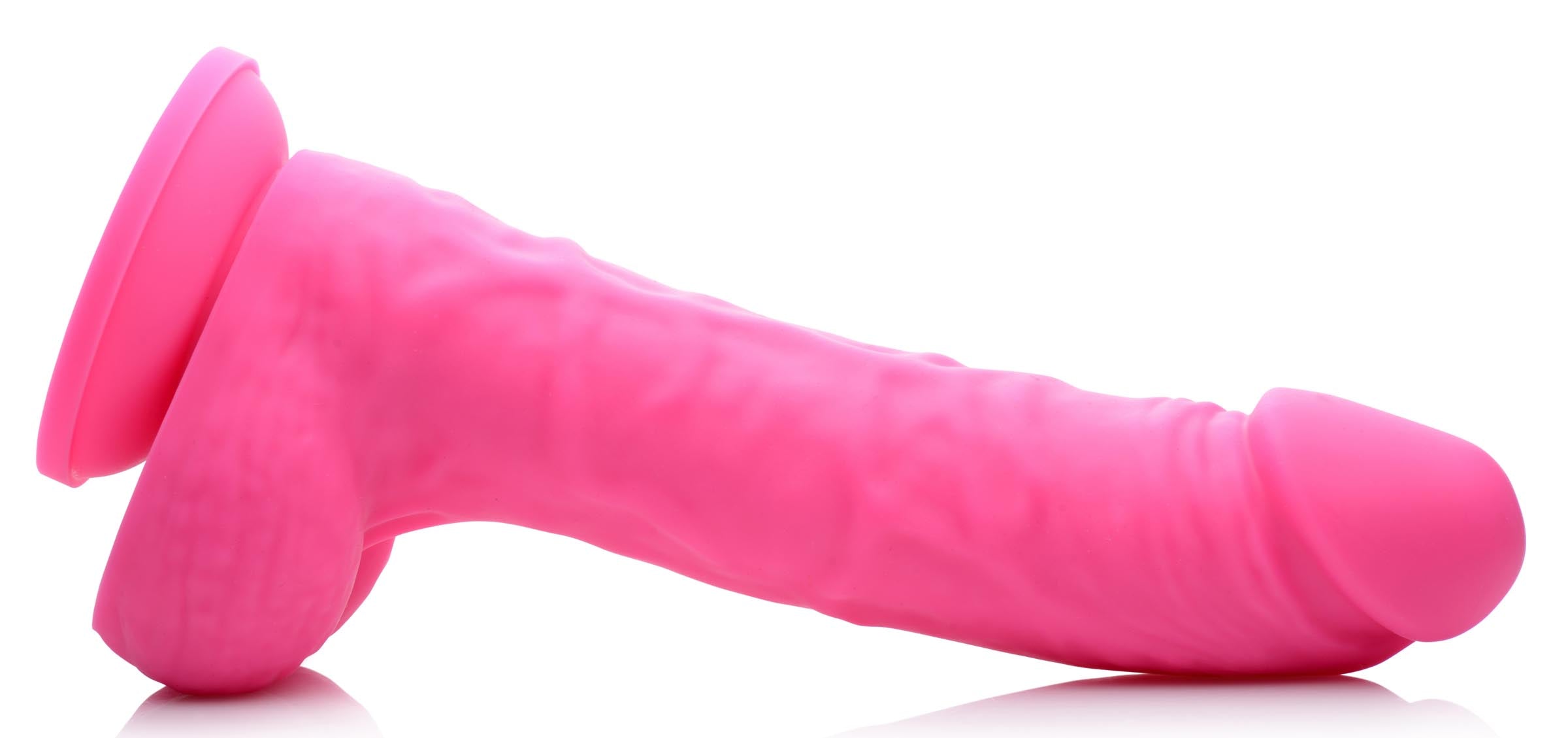 7-inch cherry silicone dildo with realistic veiny design and firm balls, perfect for hands-free use or partnered play.