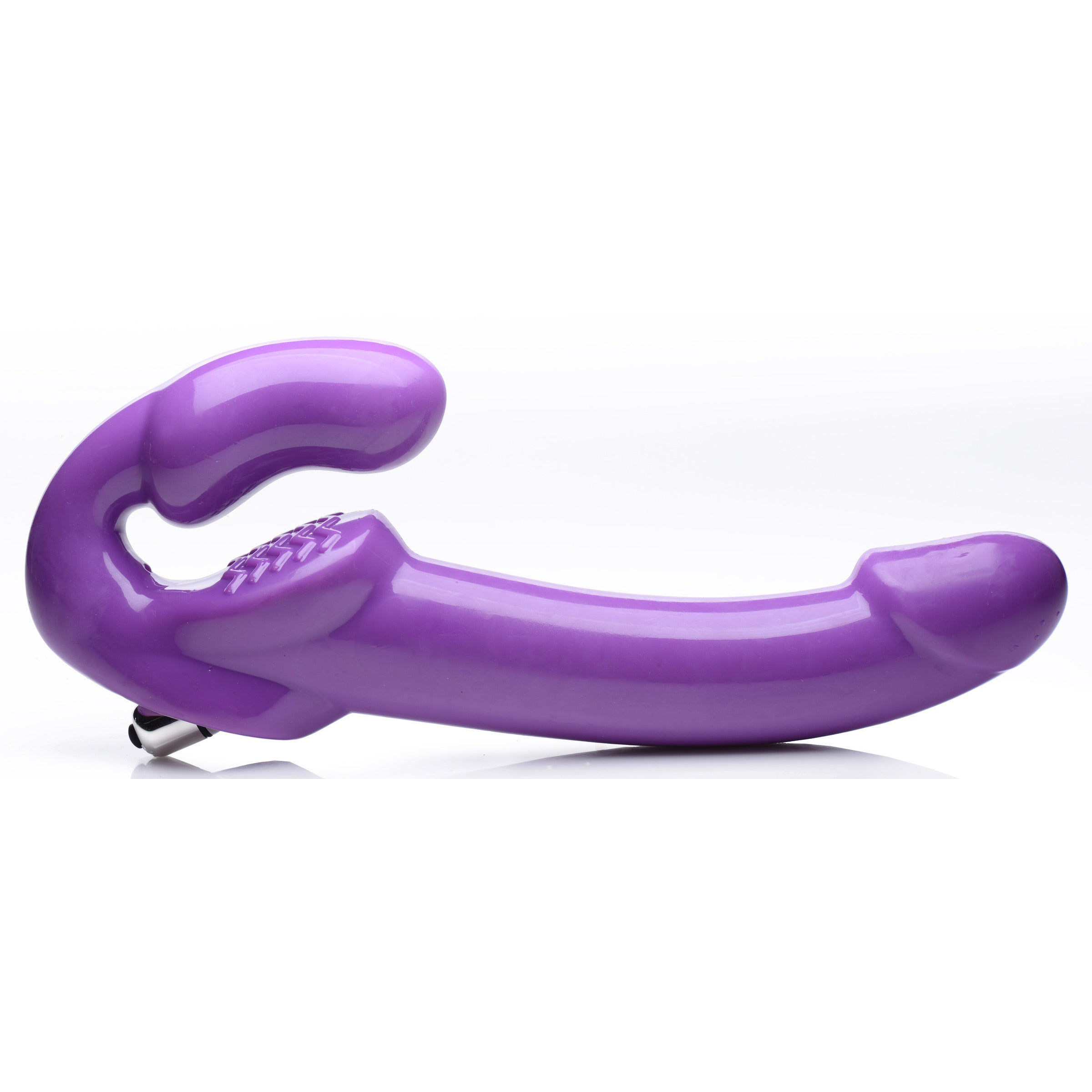 7X Revolver 2 Inch Thick Vibrating Strapless Strap-On in purple, showcasing its long shaft and vaginal bulb design for enhanced pleasure.