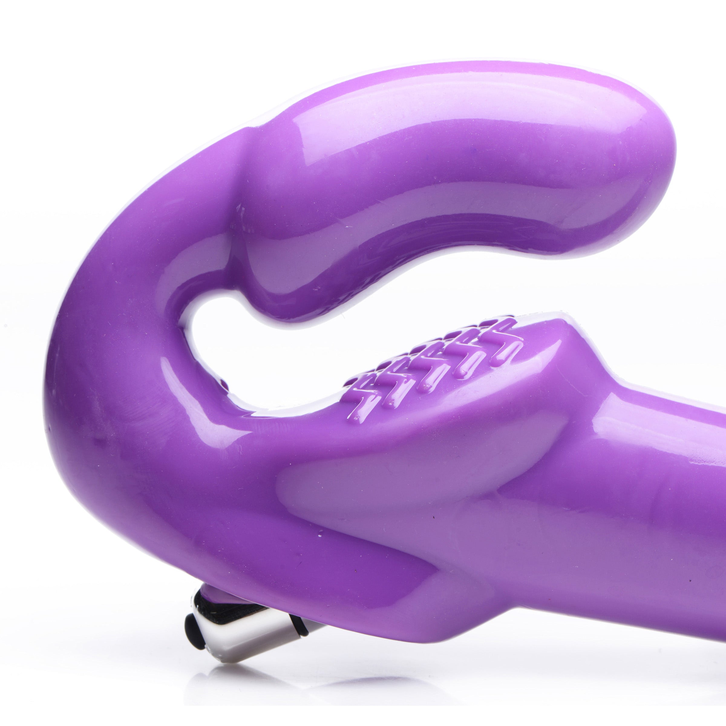 7X Revolver 2 Inch Thick Vibrating Strapless Strap-On in purple, showcasing its long shaft and vaginal bulb design for enhanced pleasure.