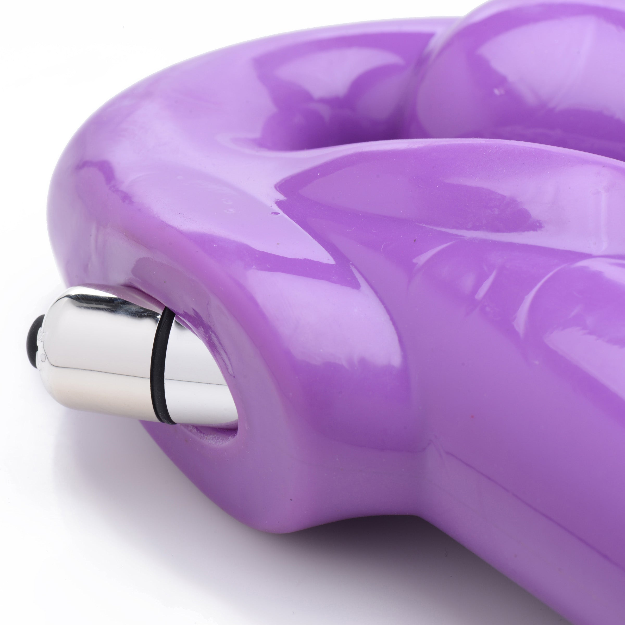 7X Revolver 2 Inch Thick Vibrating Strapless Strap-On in purple, showcasing its long shaft and vaginal bulb design for enhanced pleasure.