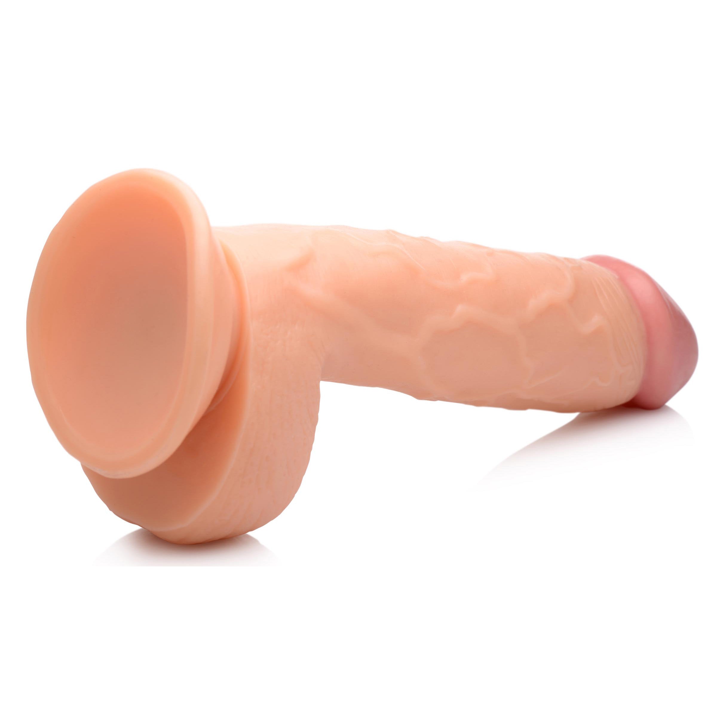 Colorful 8.25" dildo with realistic balls and suction cup base, designed for hands-free pleasure and strap-on compatibility.