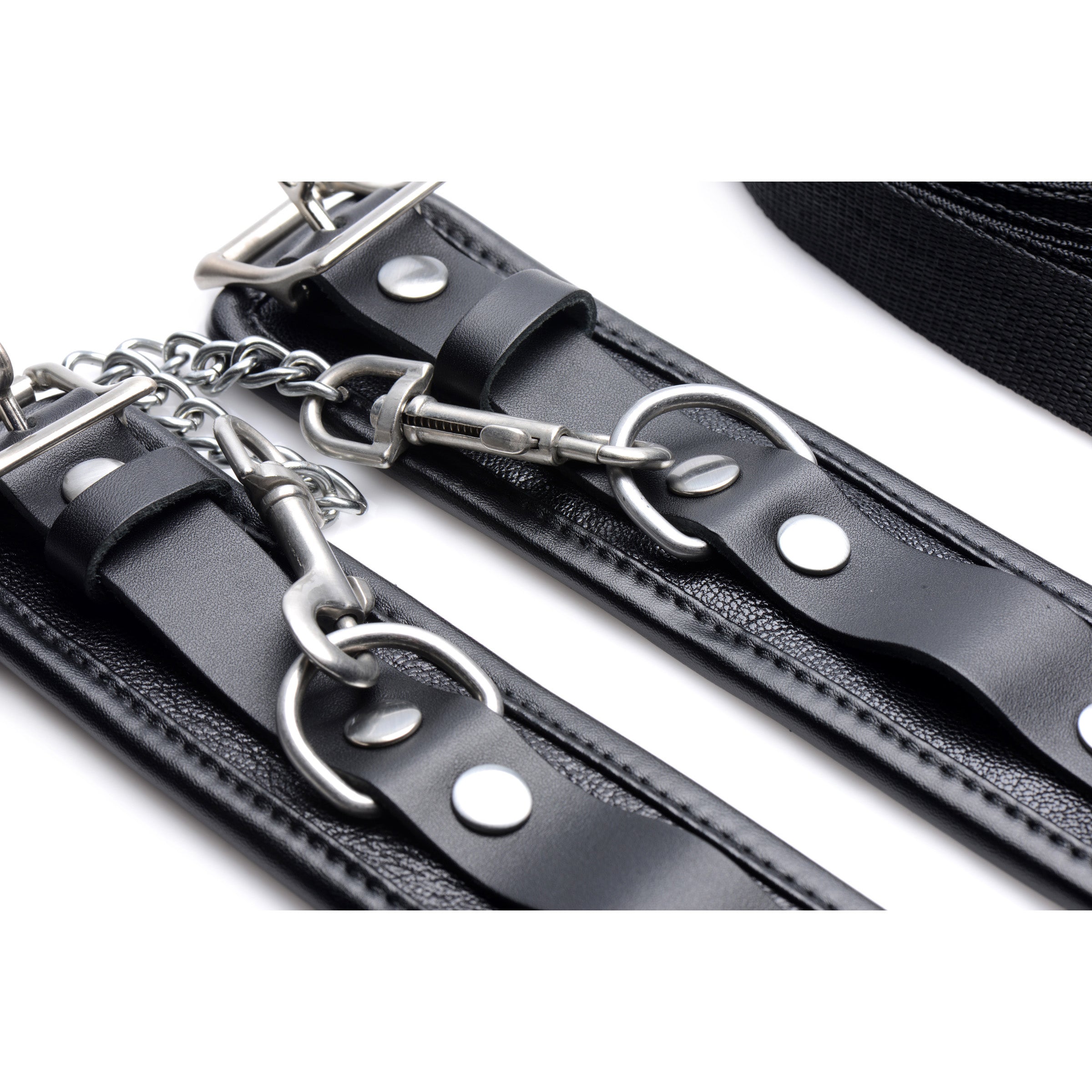 Bed Restraints Kit featuring padded leather cuffs and adjustable straps for bondage play.