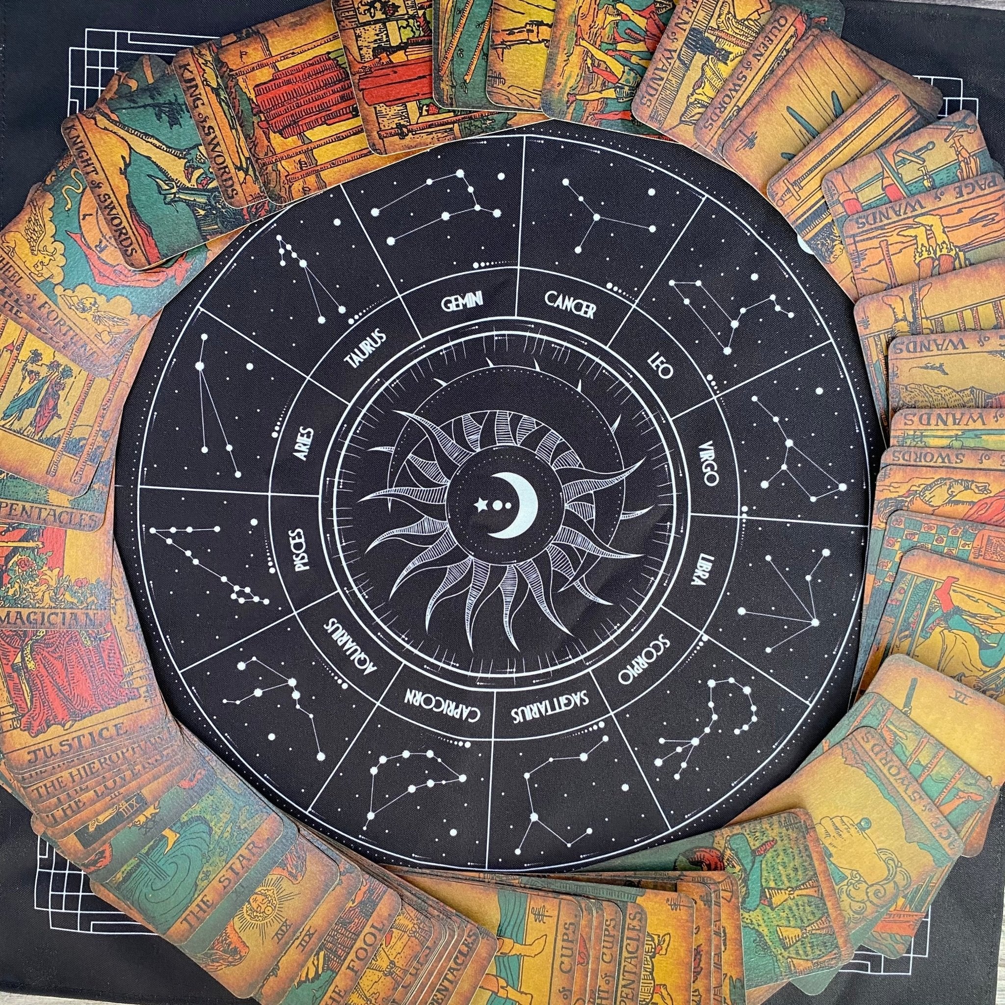 A luxurious black tarot cloth measuring 18x18 inches, designed for tarot card spreads, featuring a unique copyrighted design.