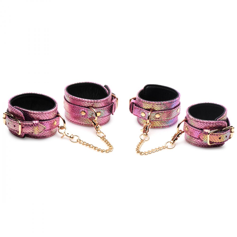 Captive Cobra 6 Piece Bondage Set featuring pink cuffs, collar, and leash with iridescent rainbow shine and golden metal accents.