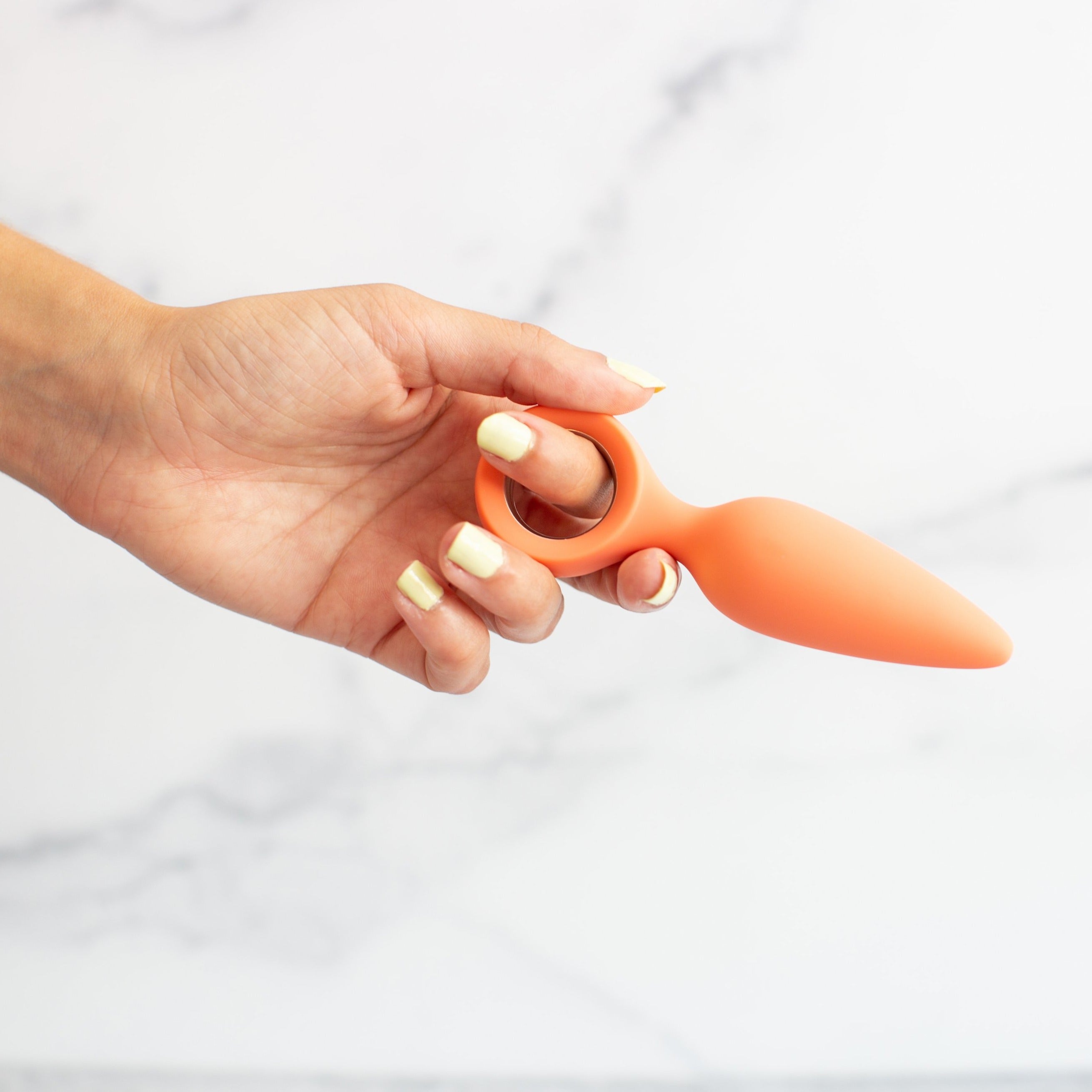 Cheeky Vibrating Butt Plug Orville, sleek design in soft silicone, showcasing its smooth surface and USB charging port.