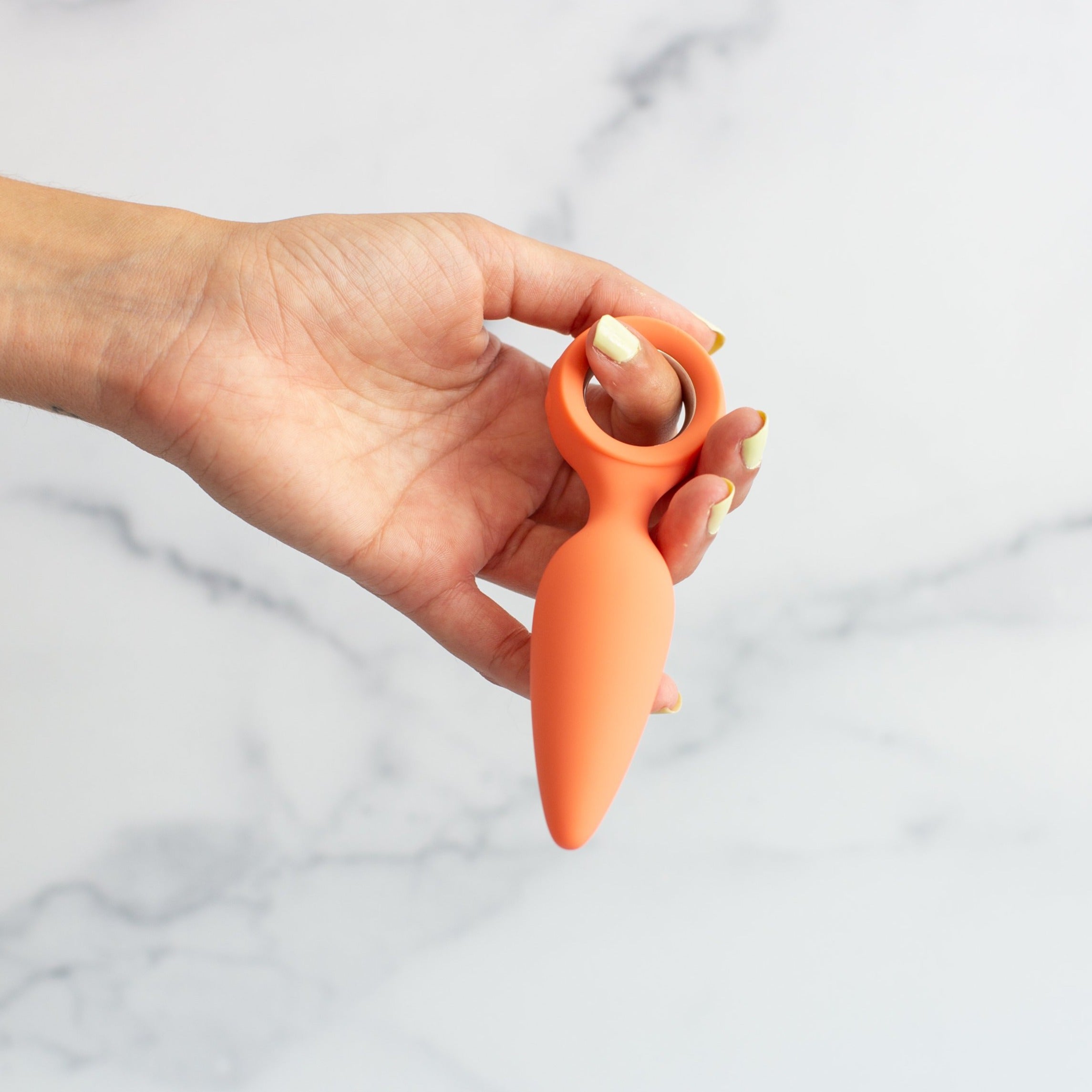 Cheeky Vibrating Butt Plug Orville, sleek design in soft silicone, showcasing its smooth surface and USB charging port.