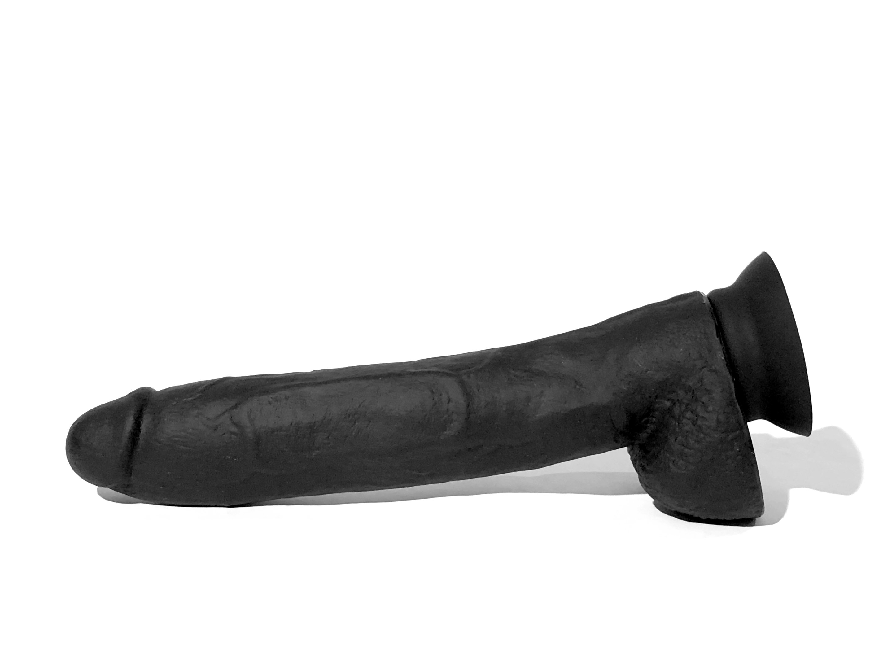 A realistic 10-inch cock molded from porn star Aron Ridge, made of soft touch silicone with interchangeable bases for versatile use.