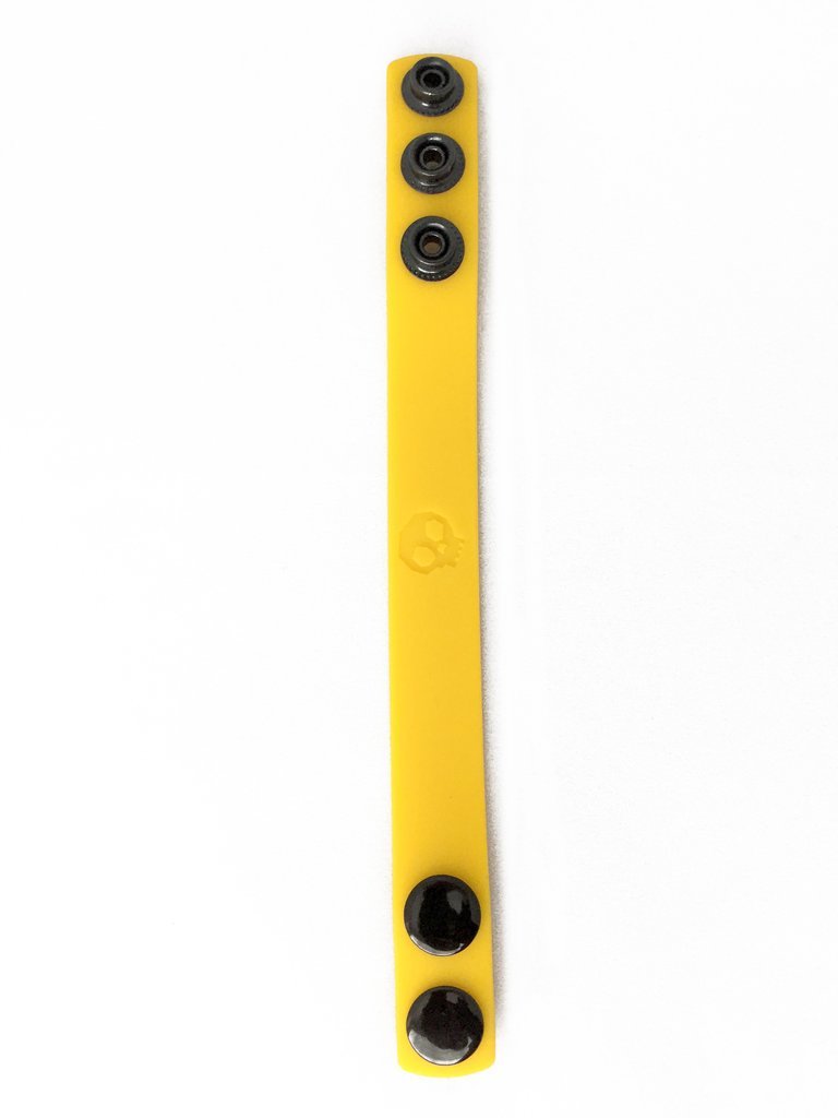 Cock Strap Yellow made of soft touch silicone with adjustable snap rings for comfort and durability, designed for enhancing performance.