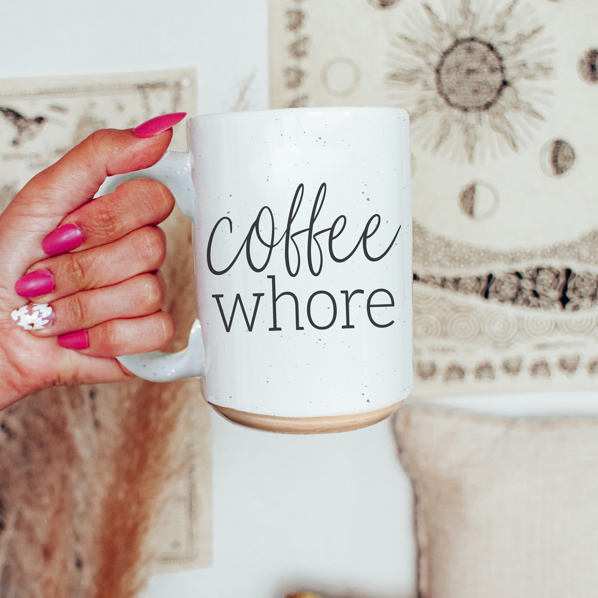 Coffee Whore Ceramic Mug with humorous graphic, off-white color with dark speckles, perfect for coffee lovers.