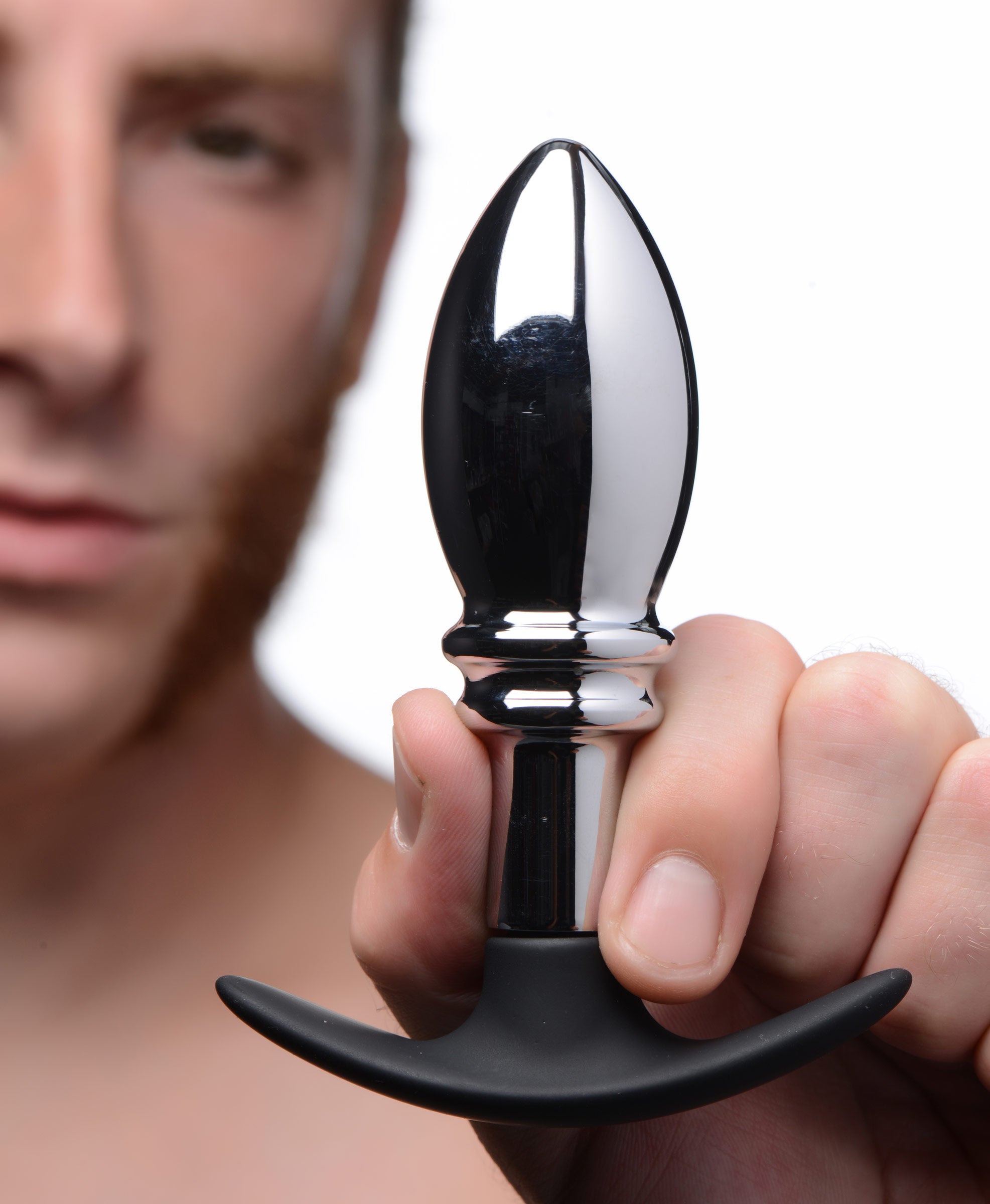 Dark Stopper Metal and Silicone Anal Plug with smooth bulb and ridges, designed for comfort and pleasure.