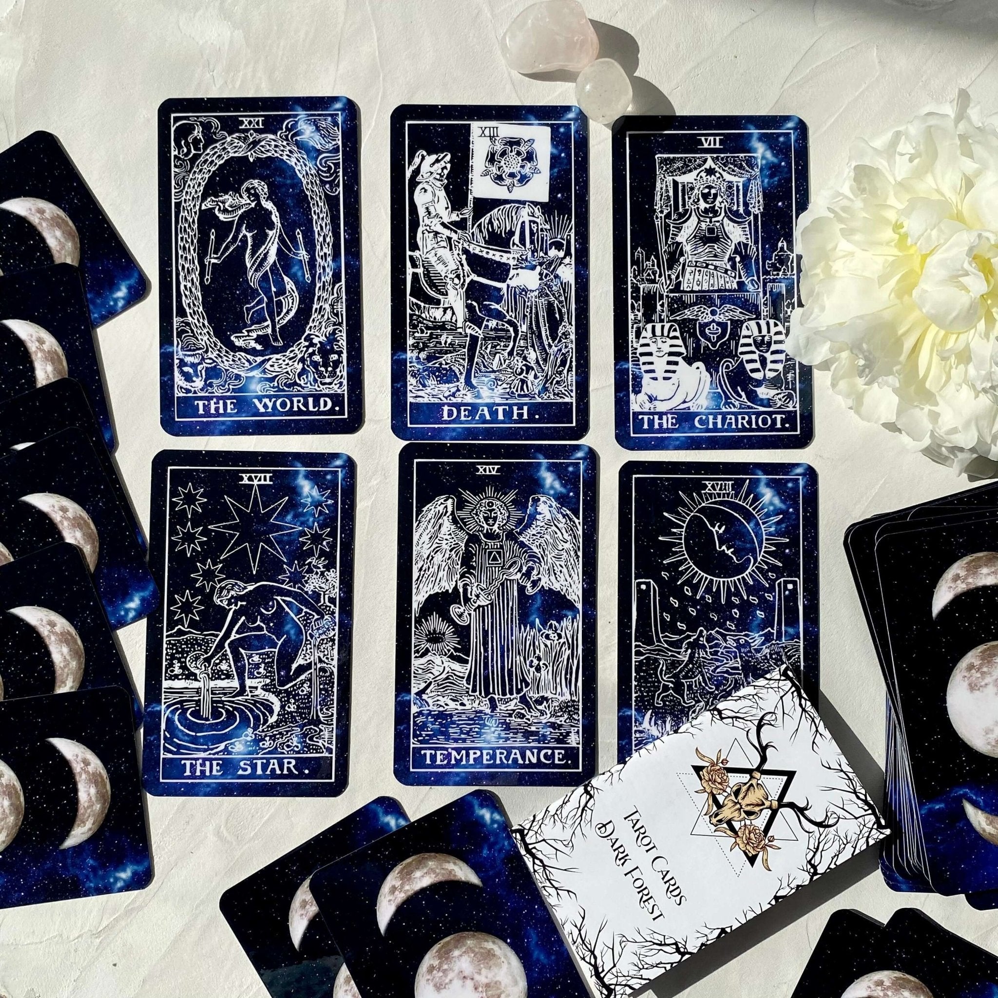 Deep Space Tarot Deck featuring cosmic designs, vibrant colors, and a guidebook, perfect for tarot readings.