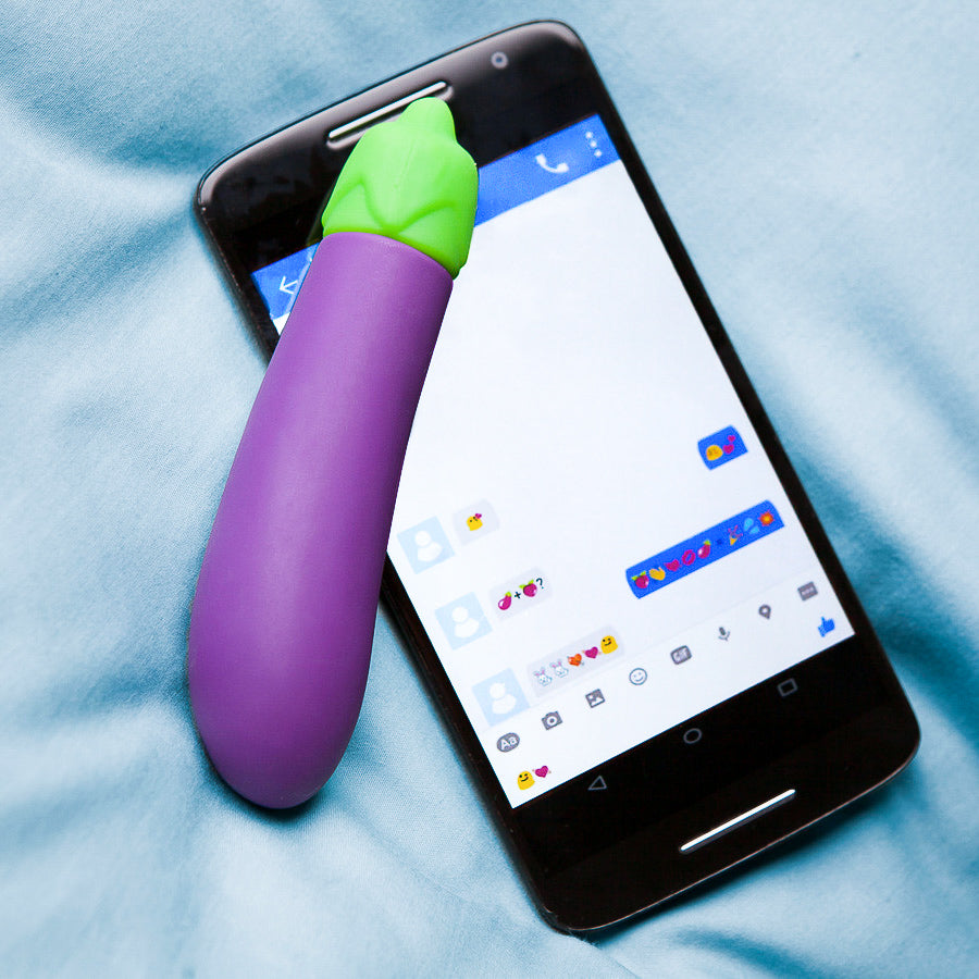 A vibrant purple eggplant-shaped vibrator with a sleek design, showcasing its 10 vibration settings and waterproof features.