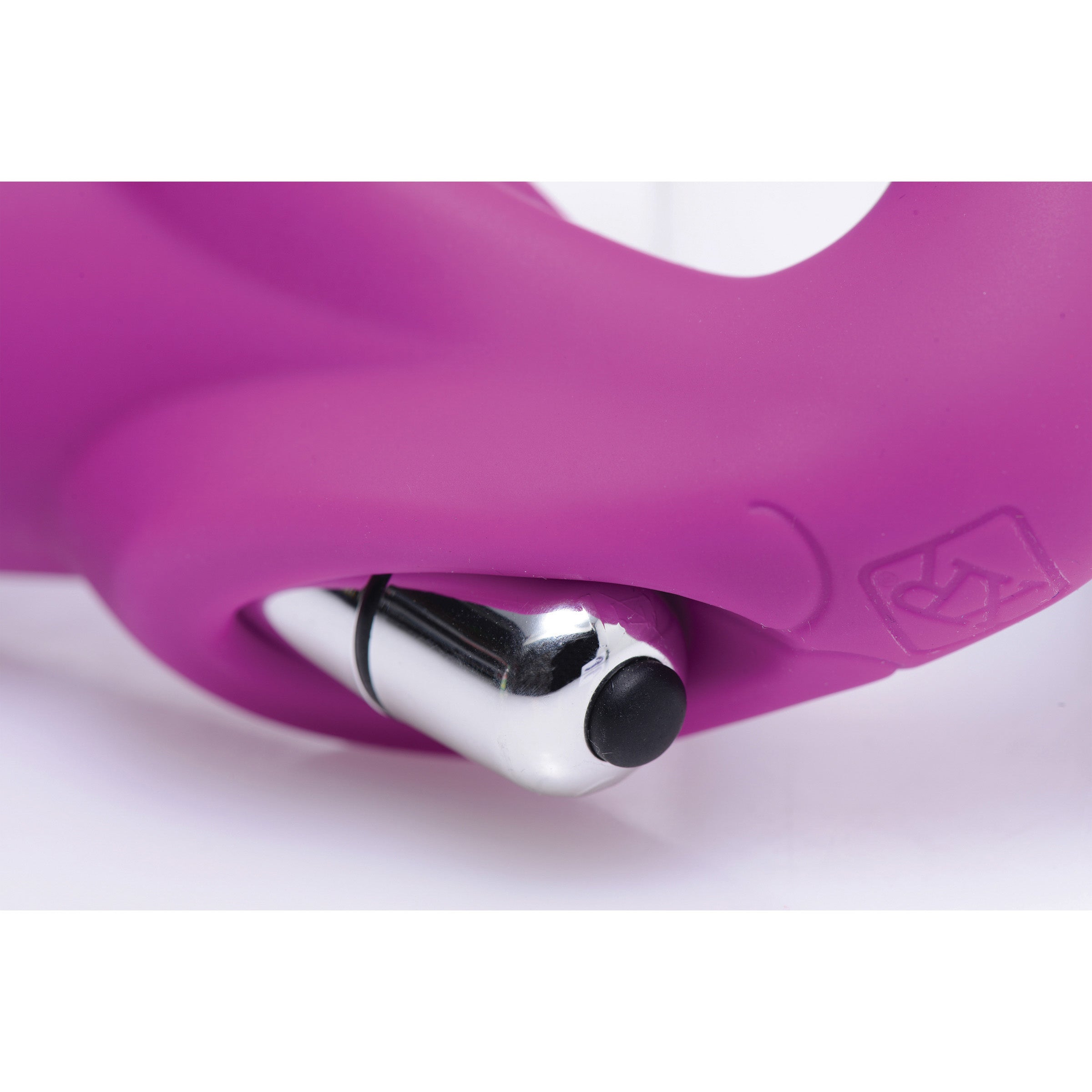 Evoke Vibrating Strapless Silicone Strap-on Dildo in pink, showcasing its curved design and smooth silicone finish.