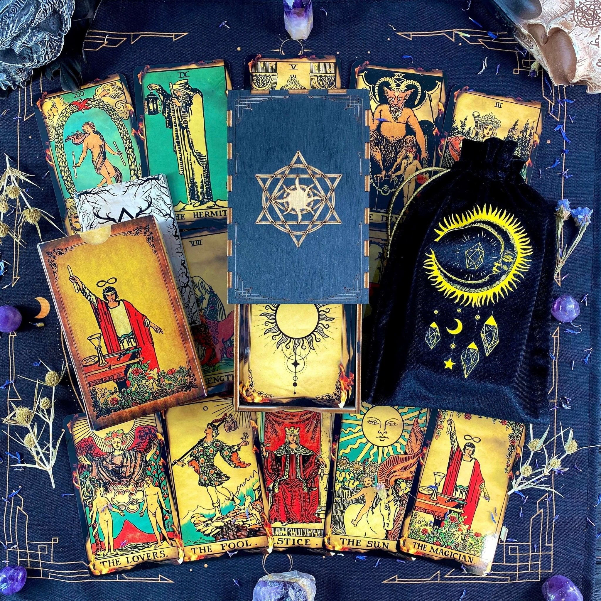 Fire Tarot Deck featuring 78 beautifully illustrated cards, a guidebook, velvet bag, and wooden box, perfect for tarot readings.