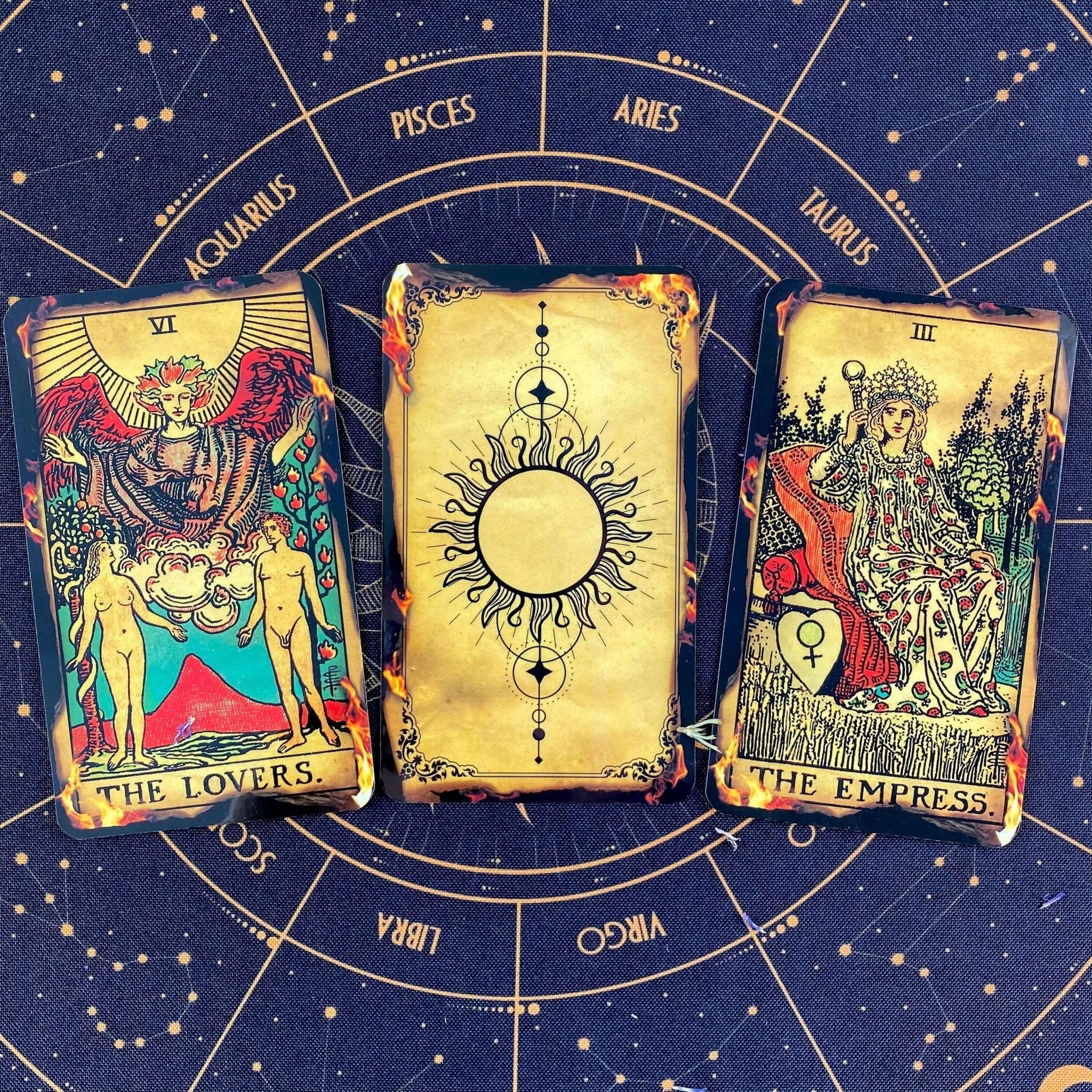 Fire Tarot Deck featuring 78 beautifully illustrated cards, a guidebook, velvet bag, and wooden box, perfect for tarot readings.