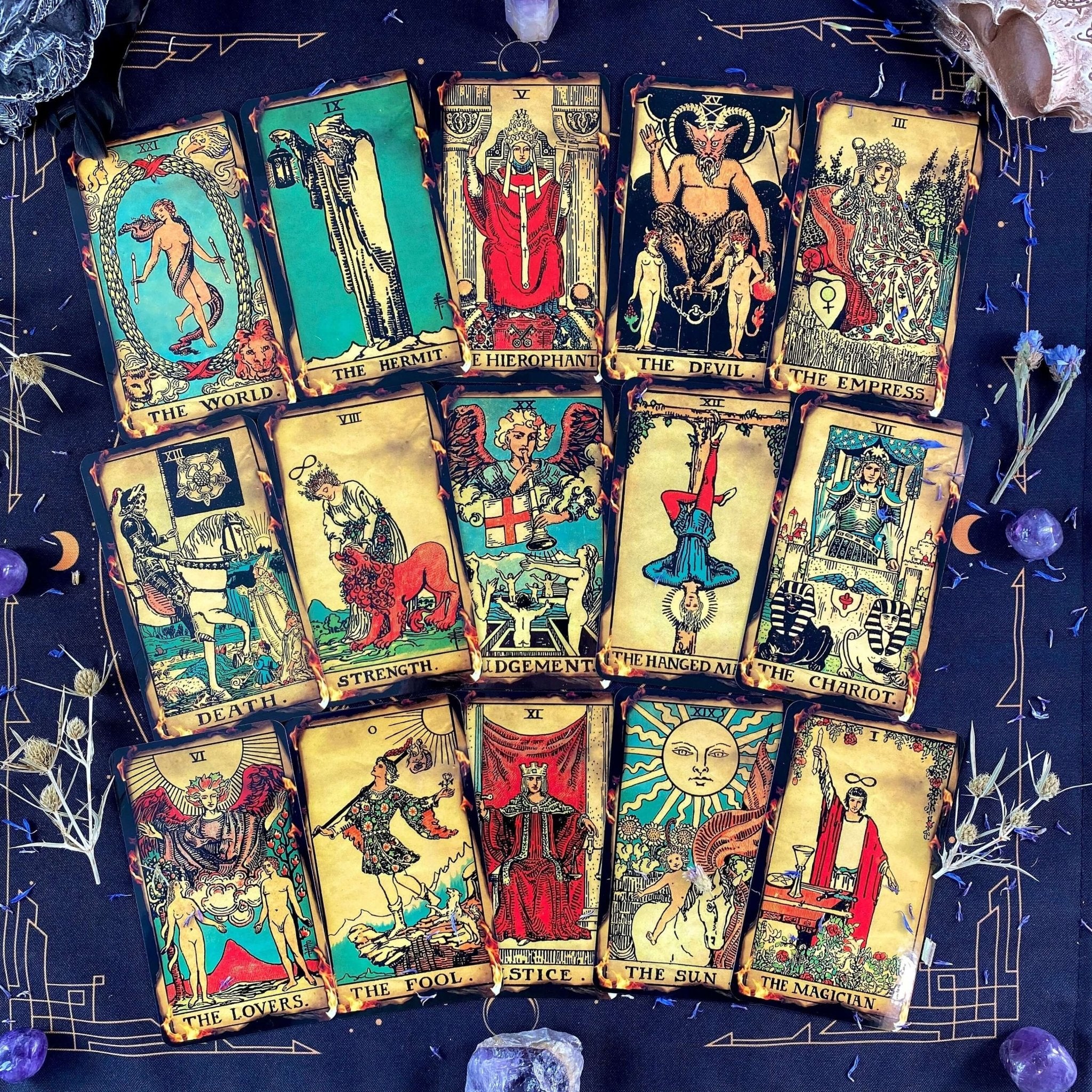 Fire Tarot Deck featuring 78 beautifully illustrated cards, a guidebook, velvet bag, and wooden box, perfect for tarot readings.