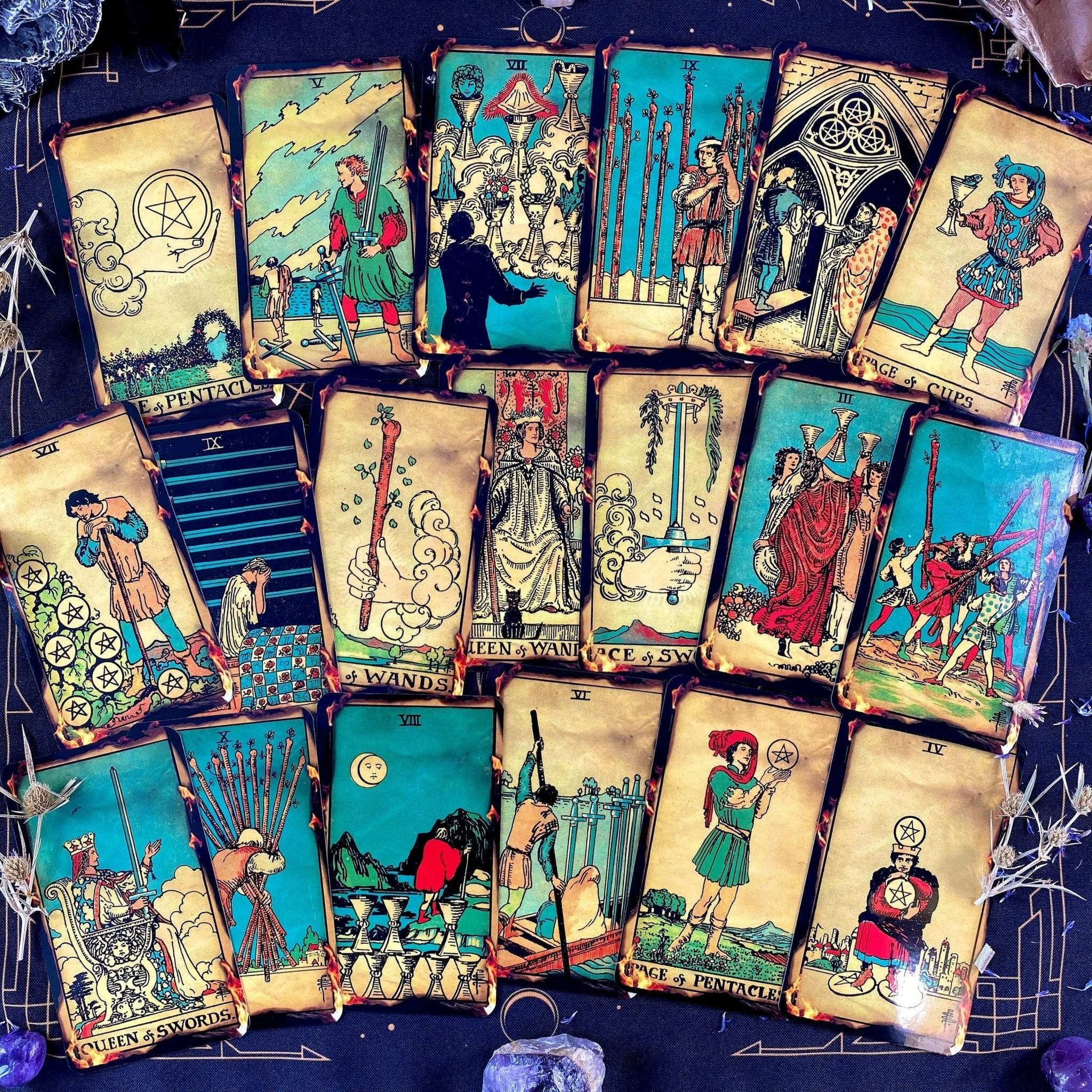 Fire Tarot Deck featuring 78 beautifully illustrated cards, a guidebook, velvet bag, and wooden box, perfect for tarot readings.