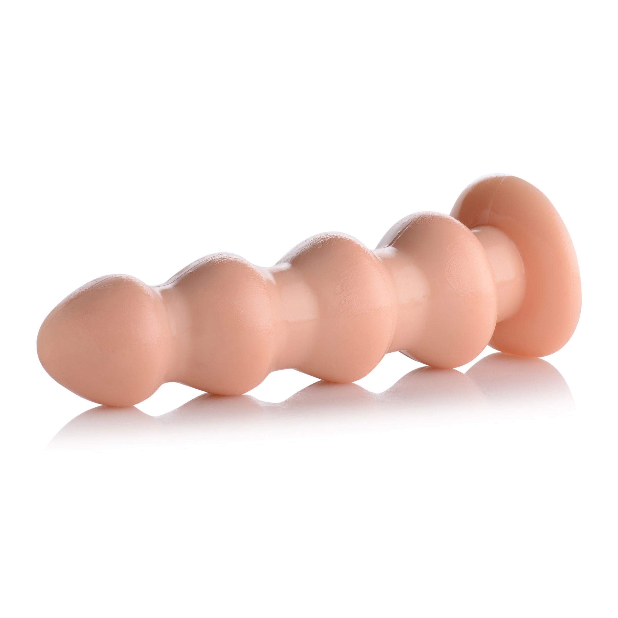 Four Stage Rocket Dildo in light color with four ripples and suction cup base, designed for intense stimulation.