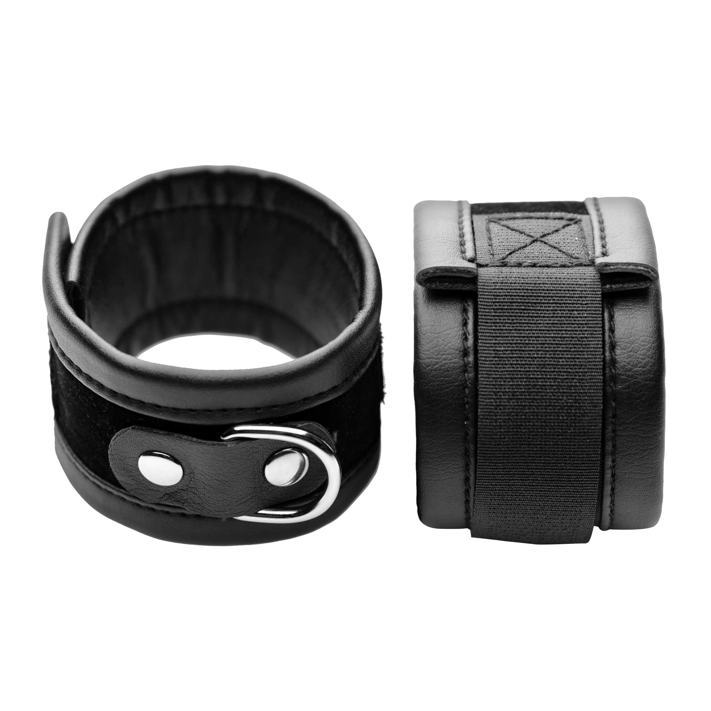 Frisky Handle Me Wrist Cuffs in black velvet and faux leather, featuring heavy-duty Velcro closures and a D-ring for versatile bondage play.