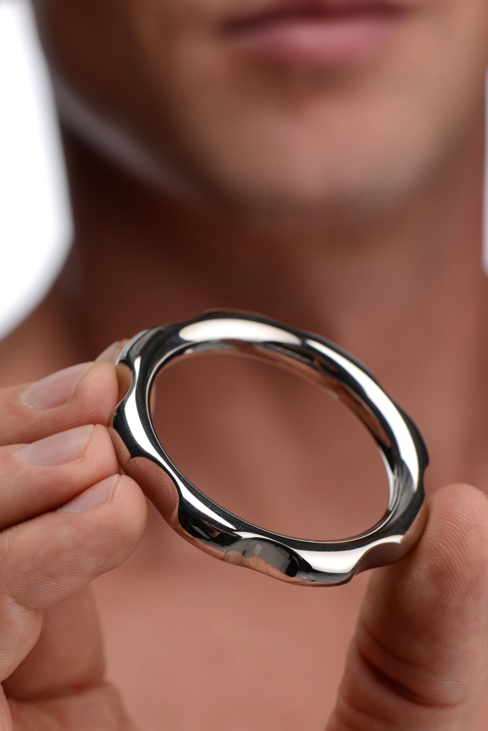 Gear Head Metal Cock Ring, 1.75 inches in diameter, made of durable stainless steel with a smooth finish.