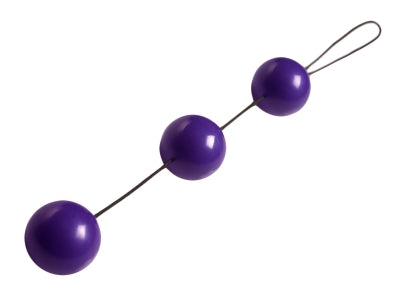 Geisha Triple Trainer Ben Wa Balls in purple, showcasing dual-layered design and nylon retrieval cord.