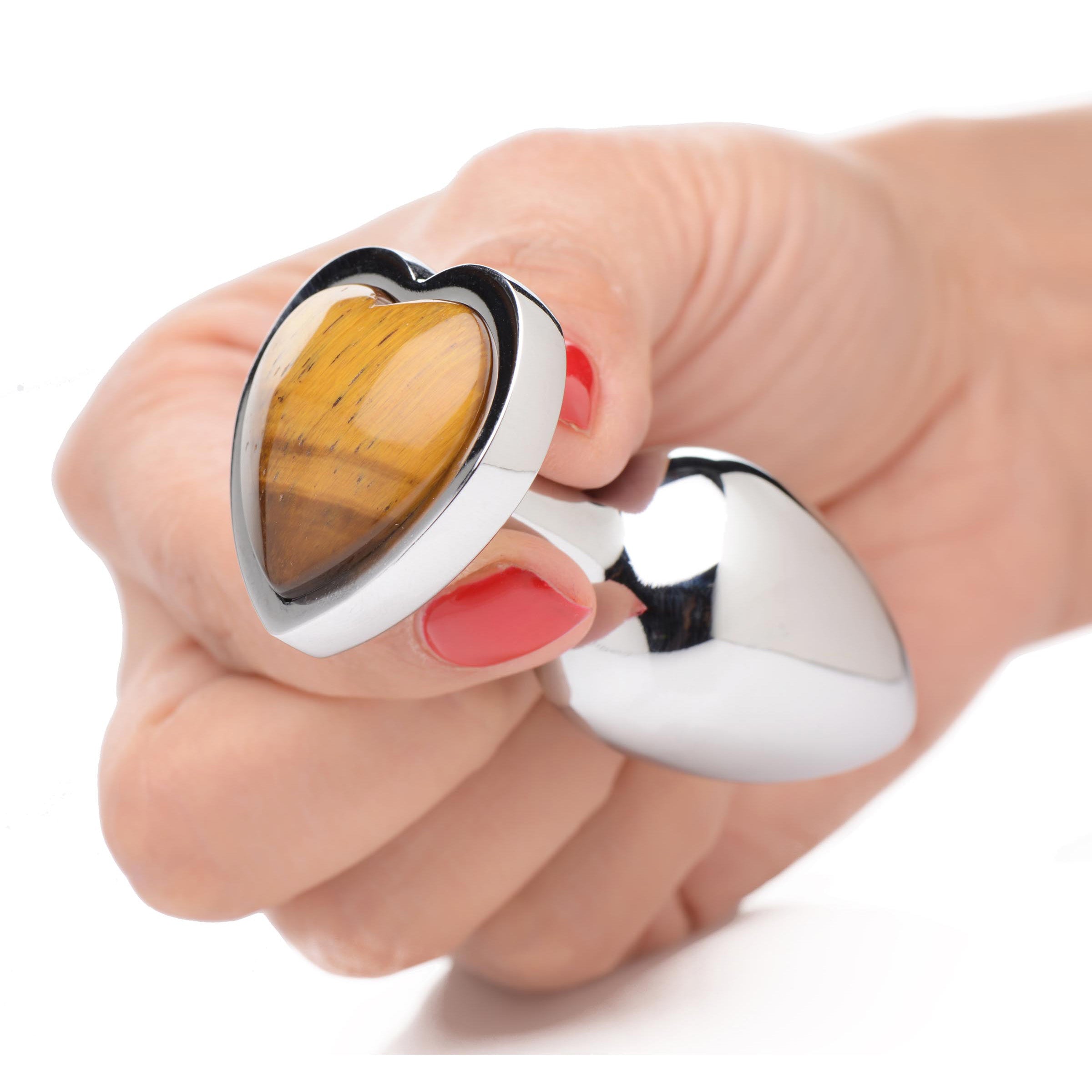 A medium-sized heart-shaped anal plug made of genuine Tiger's Eye gemstone and nickel-free aluminum alloy, showcasing its smooth surface and elegant design.