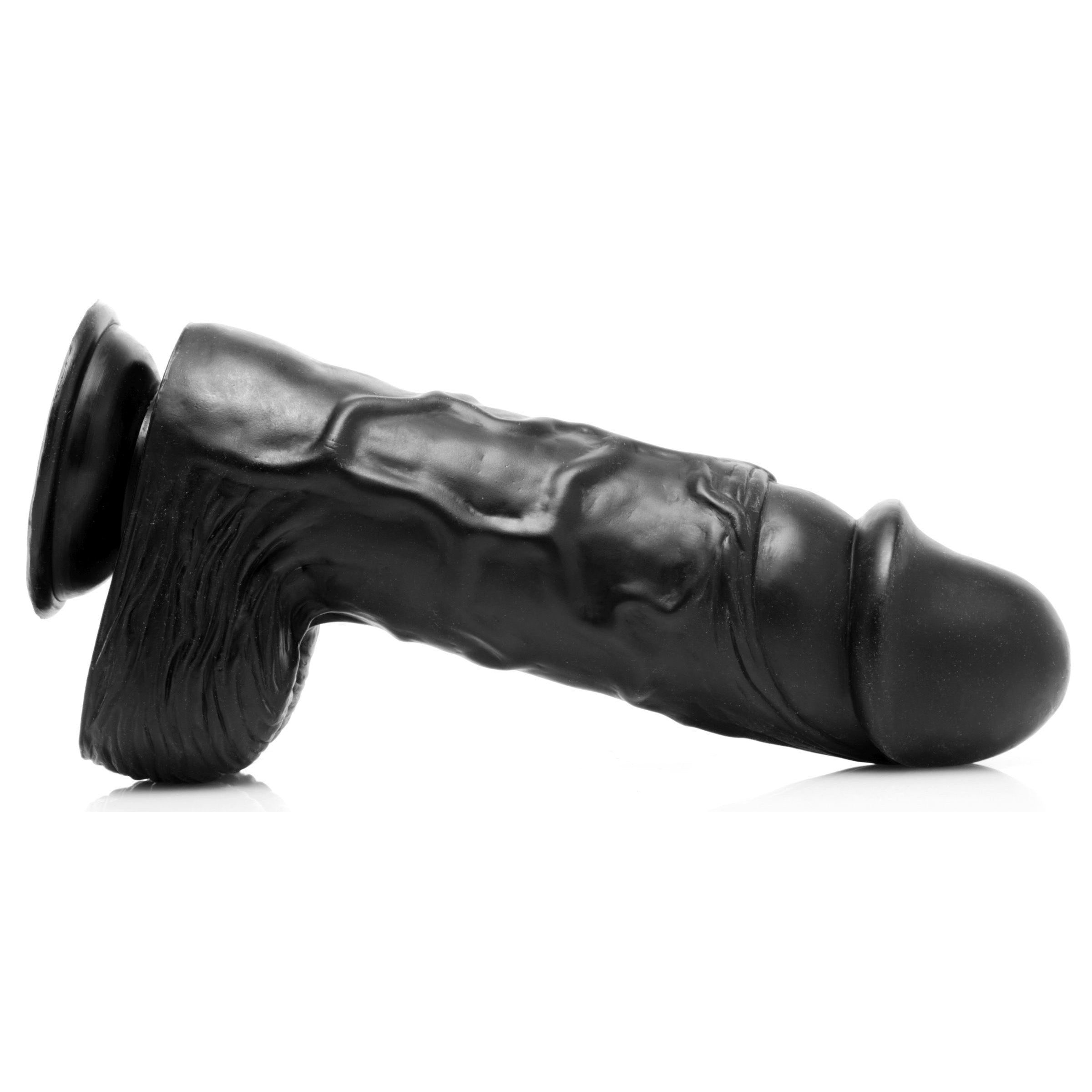 Giant Black 10.5" Dong with bulging veins and suction cup base, designed for intense pleasure.