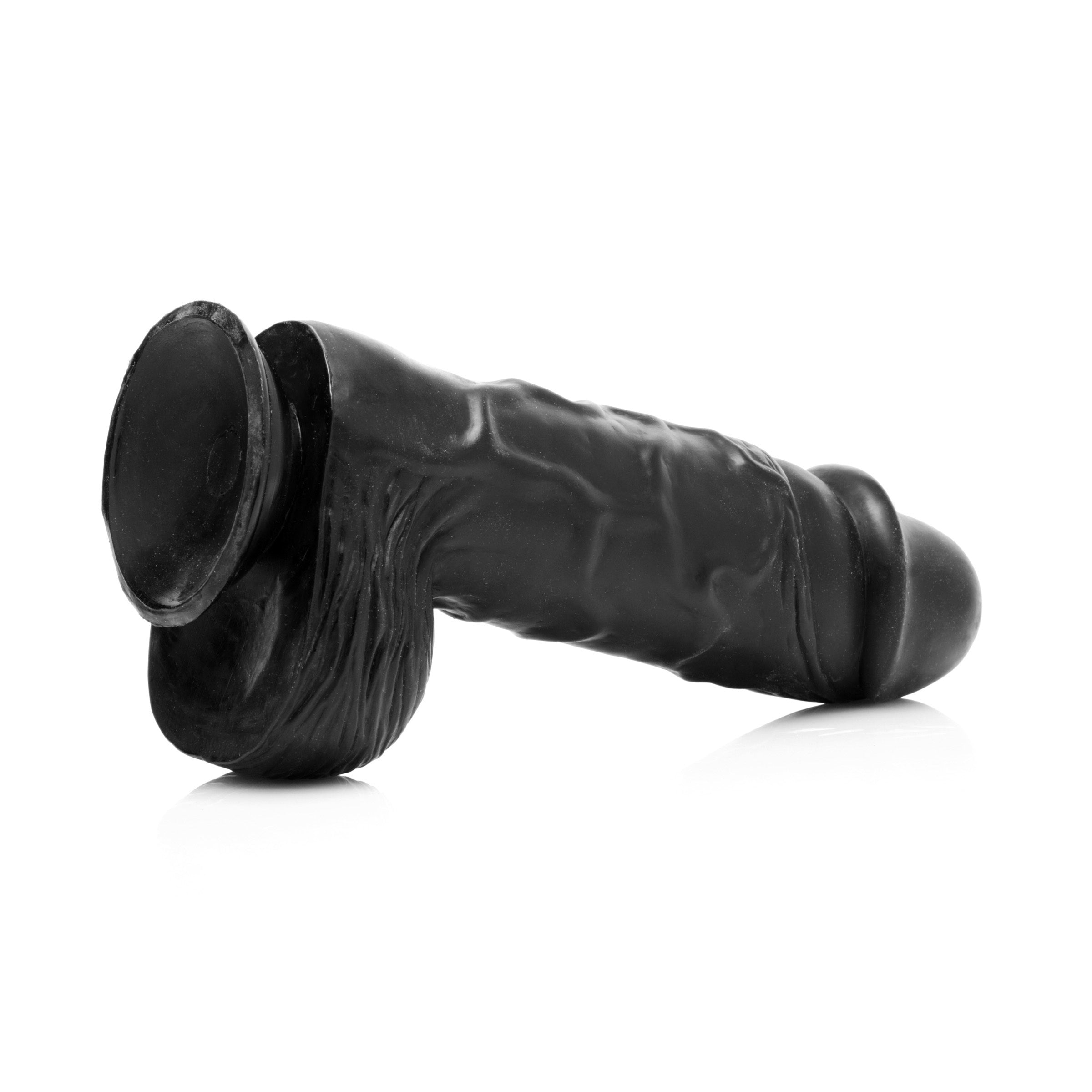 Giant Black 10.5" Dong with bulging veins and suction cup base, designed for intense pleasure.