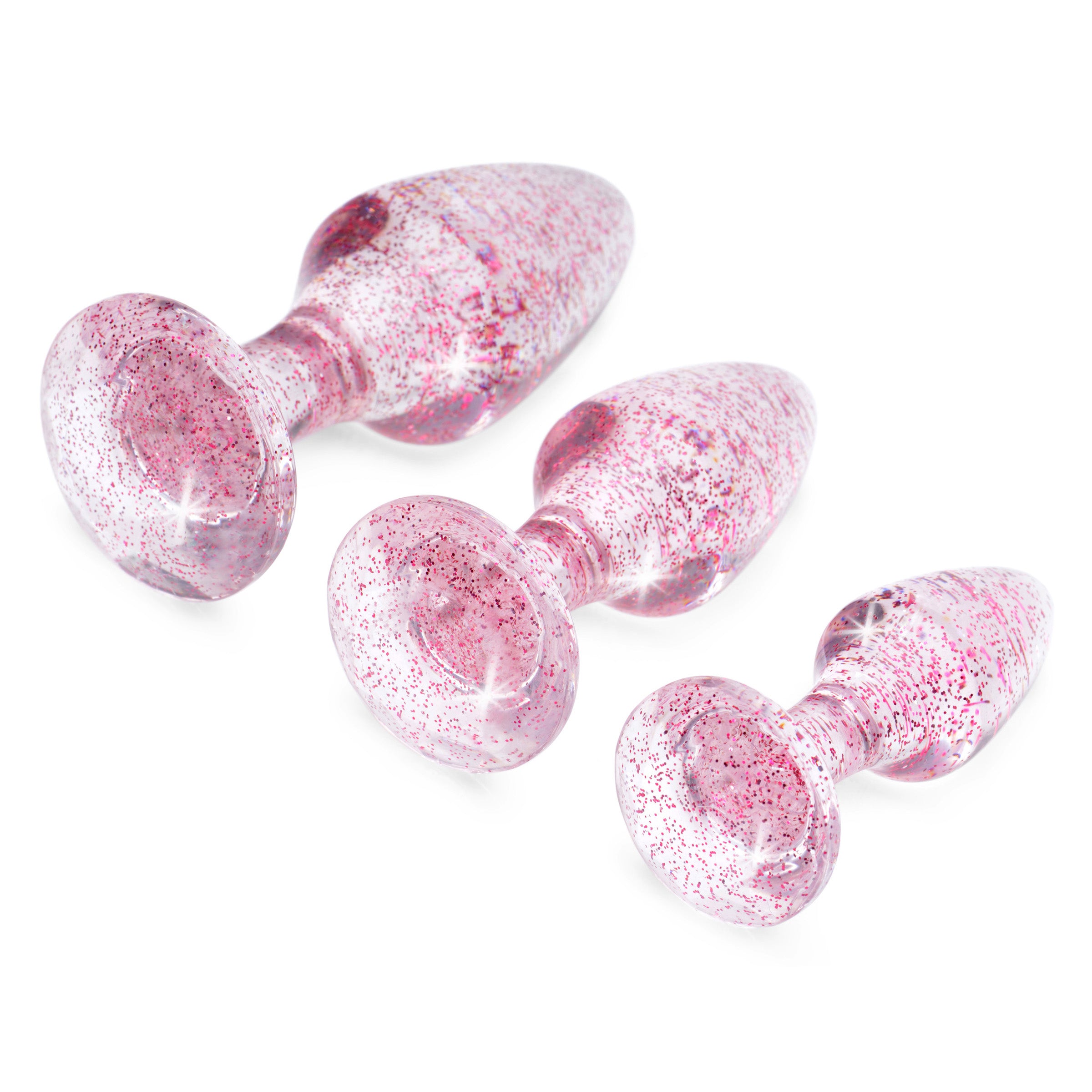 Glitter Gem Anal Plug Set in pink, featuring three graduated sizes with a shiny glittery design for enhanced anal play.