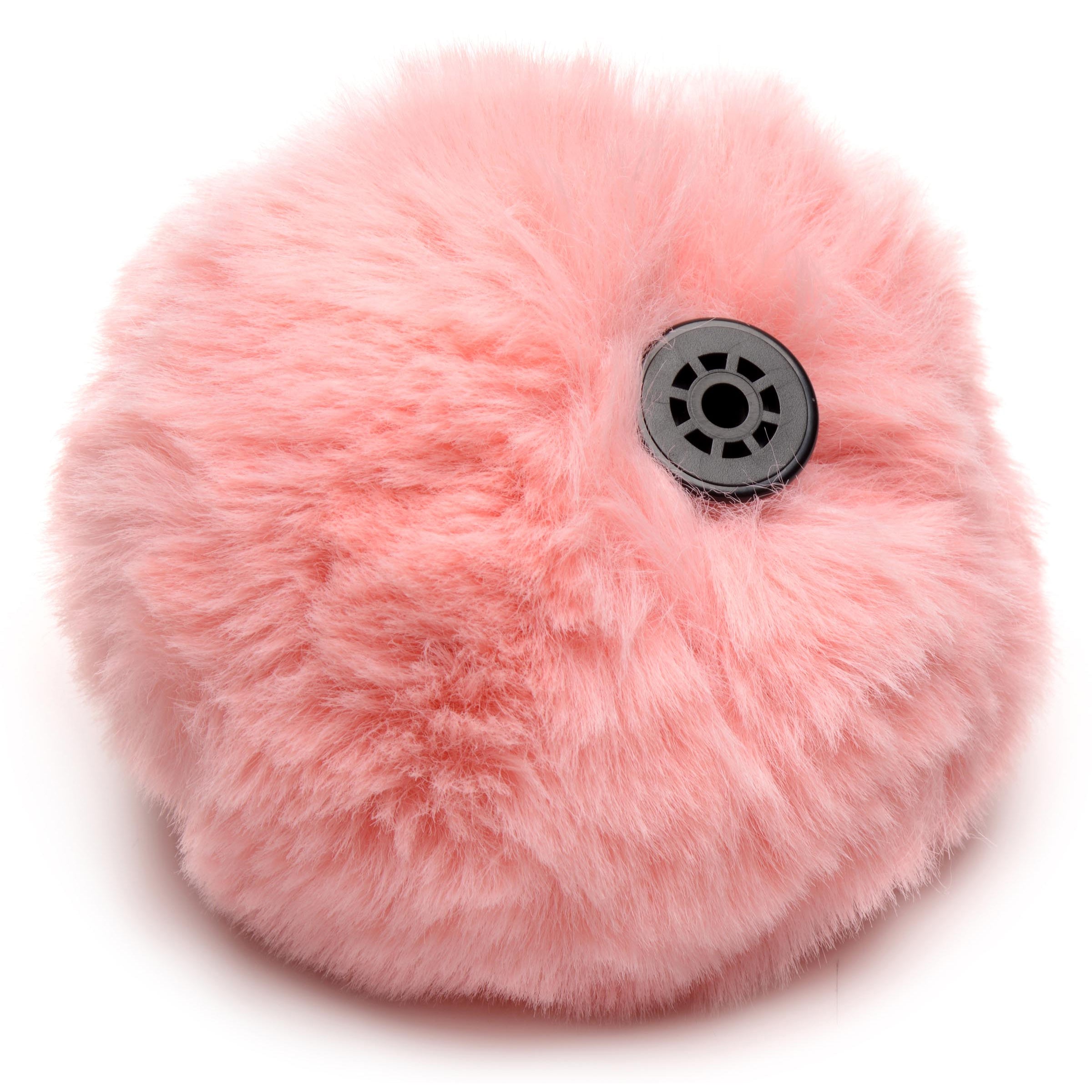 A soft and fluffy pink bunny tail designed for playful animal roleplay, attached to a Snap-On base for easy interchangeability with anal plugs.