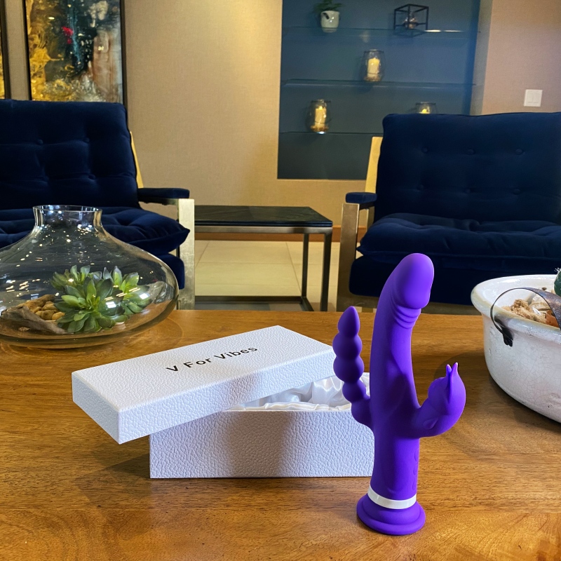 Purple vibrator on a table.