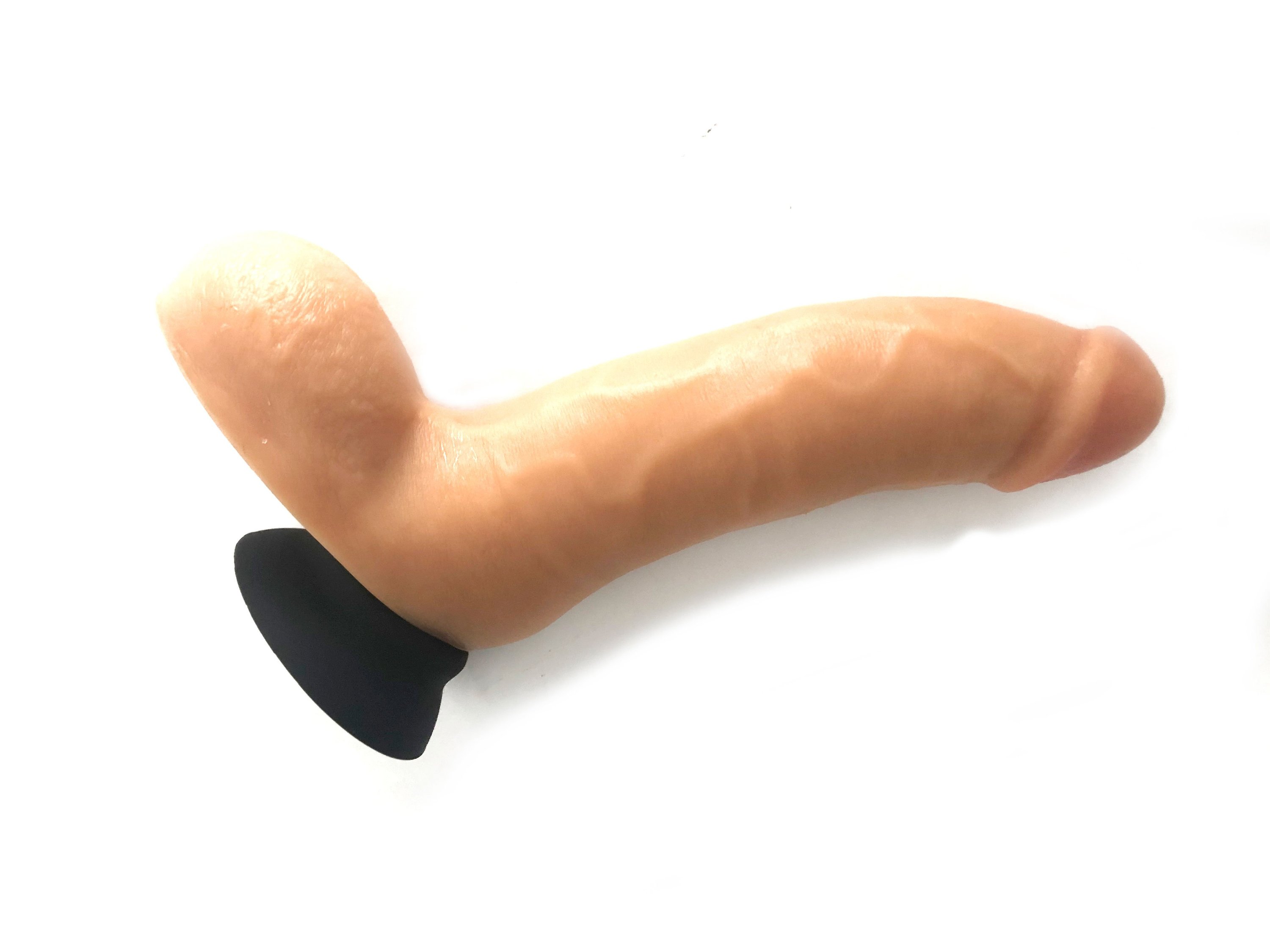 Jocks Adam Dildo made from soft touch silicone, featuring a lifelike design and interchangeable bases for versatile use.