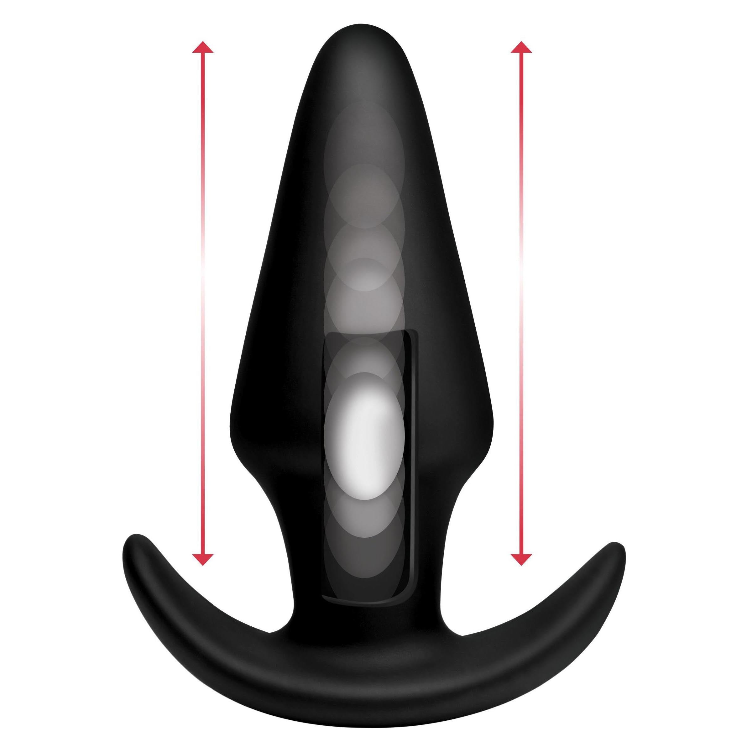 Kinetic Thumping 7X Large Anal Plug in black silicone with remote control, showcasing its tapered design and impressive girth.