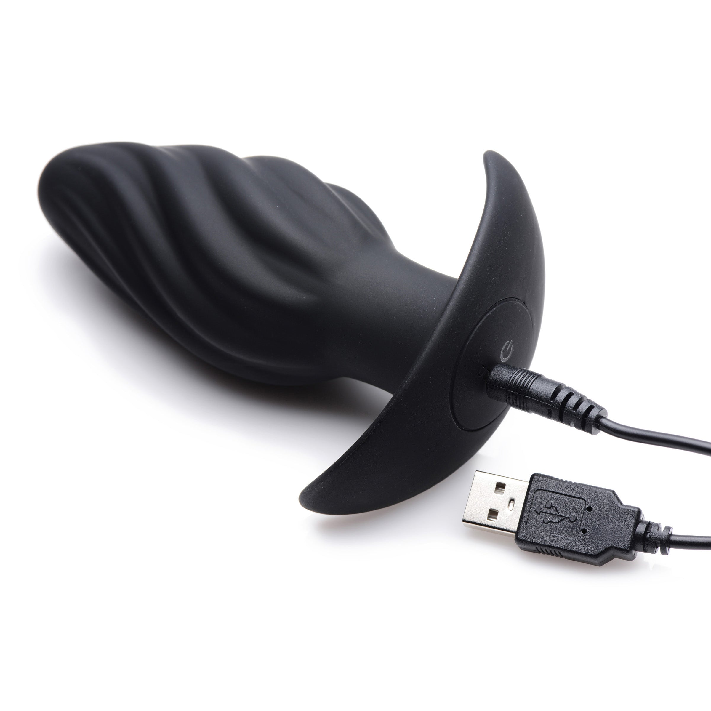 Kinetic Thumping 7X Swirled Anal Plug in black silicone with remote control, showcasing its unique swirled design and powerful thumping feature.