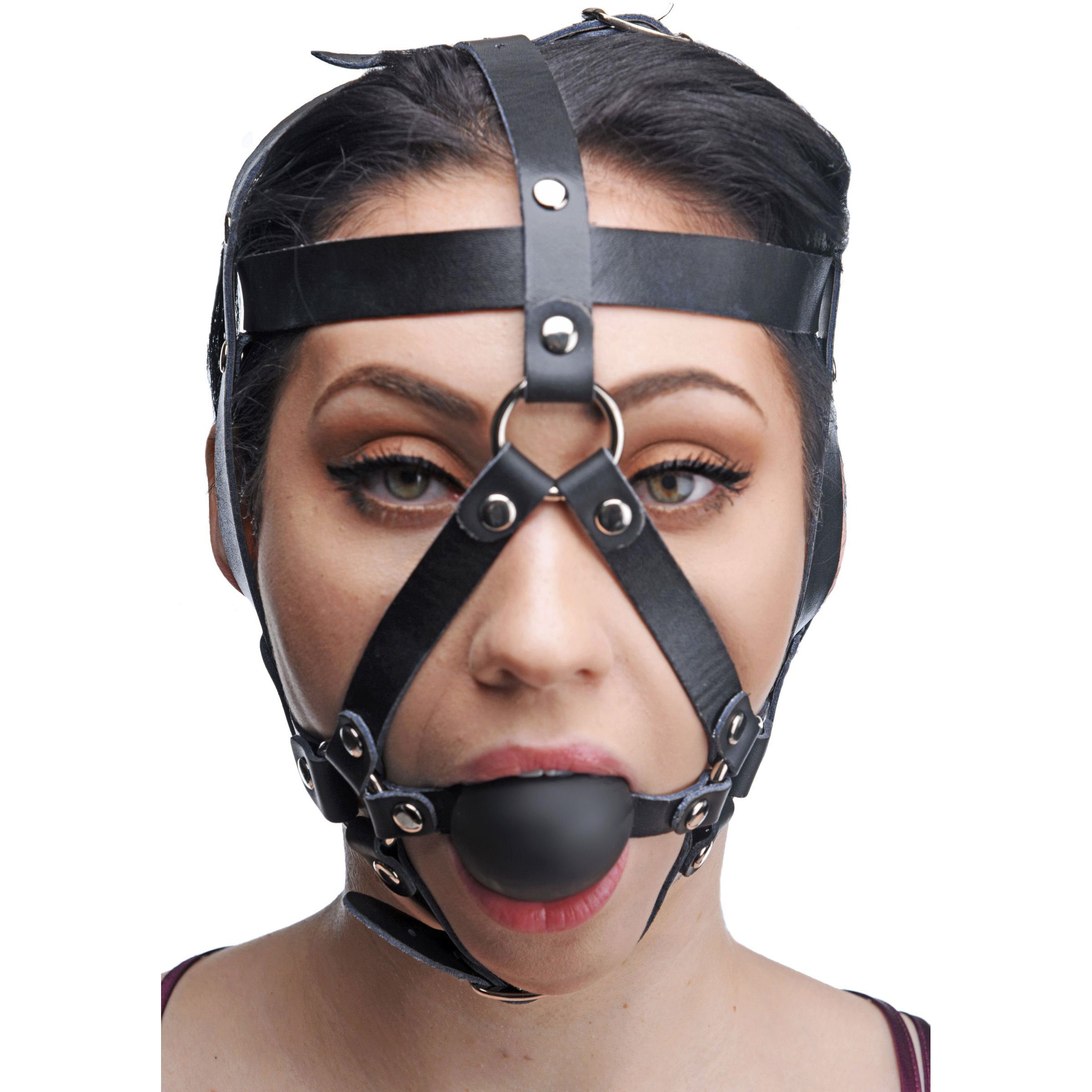 Leather head harness with a black ball gag, featuring adjustable straps for a secure fit, perfect for bondage play.