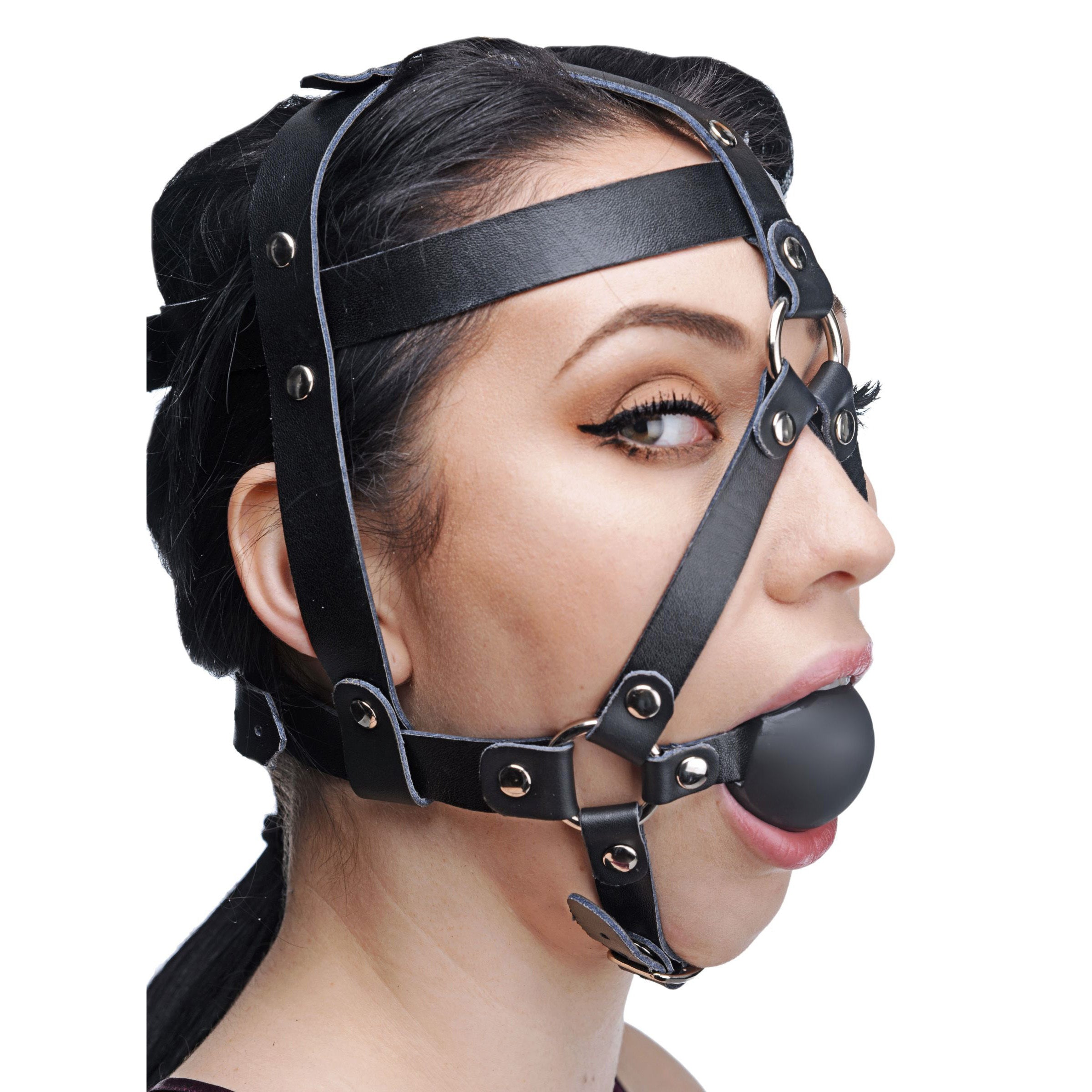 Leather head harness with a black ball gag, featuring adjustable straps for a secure fit, perfect for bondage play.