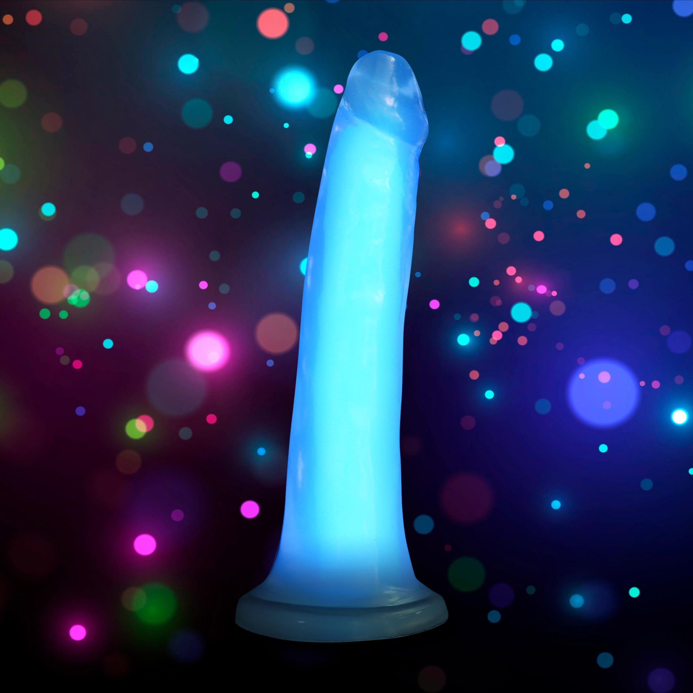 Lollicock 7" Glow-in-the-Dark Silicone Dildo in Blue, showcasing its realistic shape and flanged base.