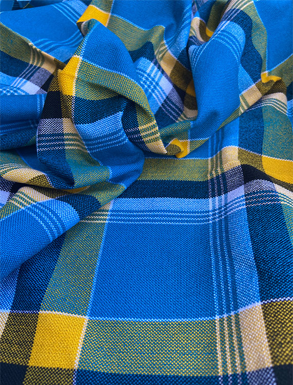 A vibrant Maasai Shuka blanket featuring traditional patterns, made from 100% acrylic, measuring approximately 150cm x 200cm, ideal for various uses.