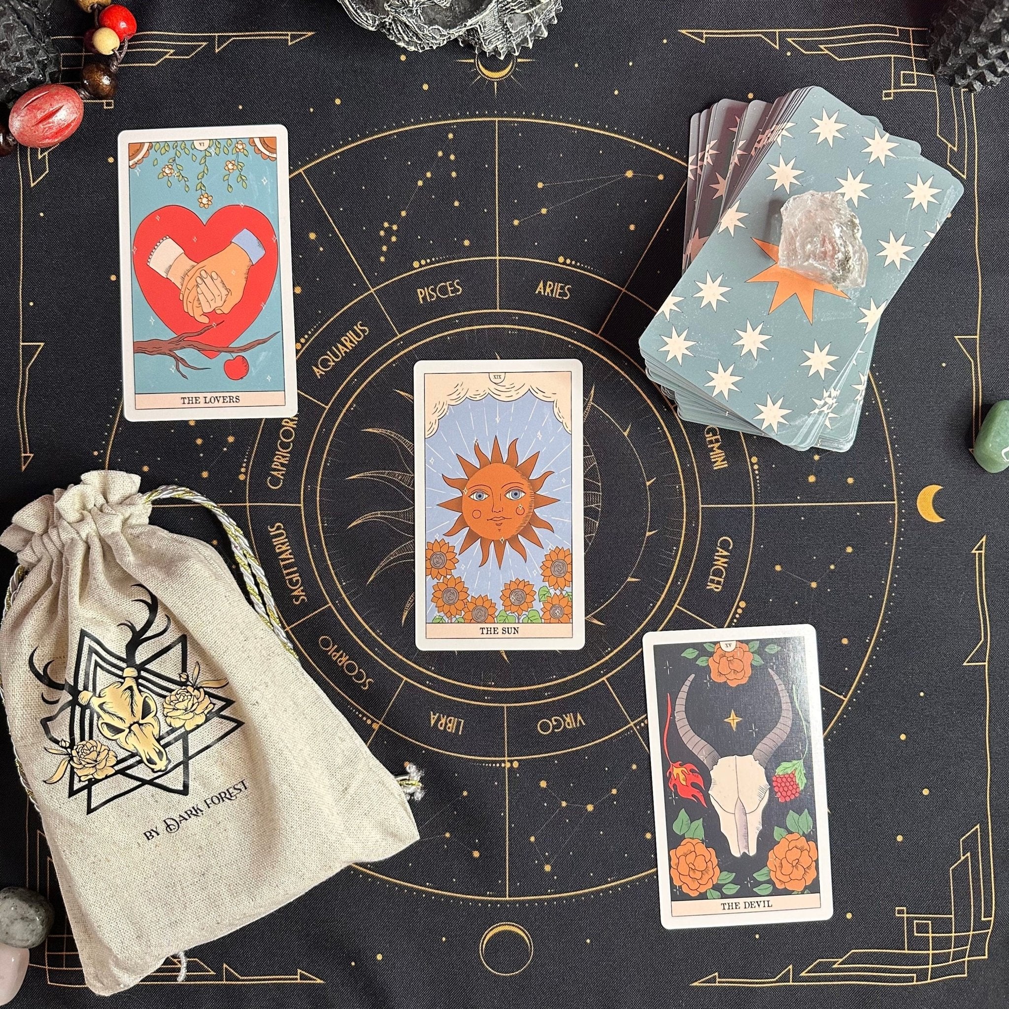 Moon Magic Tarot Deck featuring eco-friendly linen cardboard with vibrant illustrations and a guidebook, perfect for spiritual exploration.